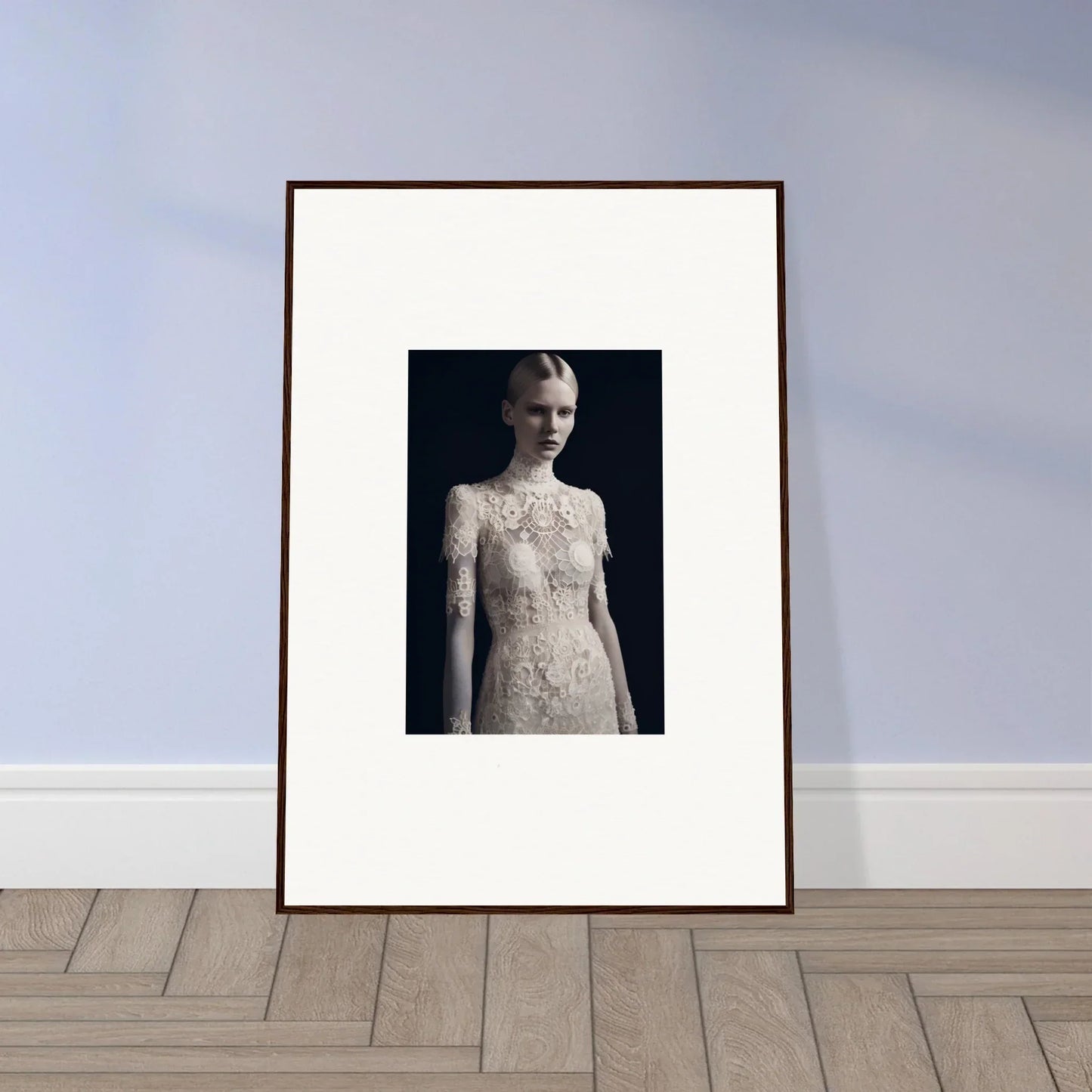 Framed black and white photograph of a person in an intricate lace dress for marble dreams room decor