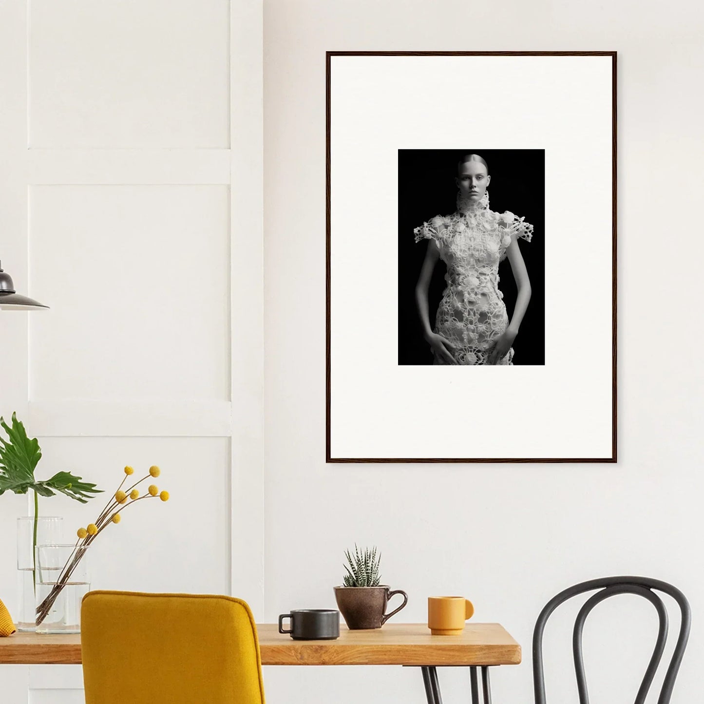 Framed black and white portrait of a person in ornate garment for room decor