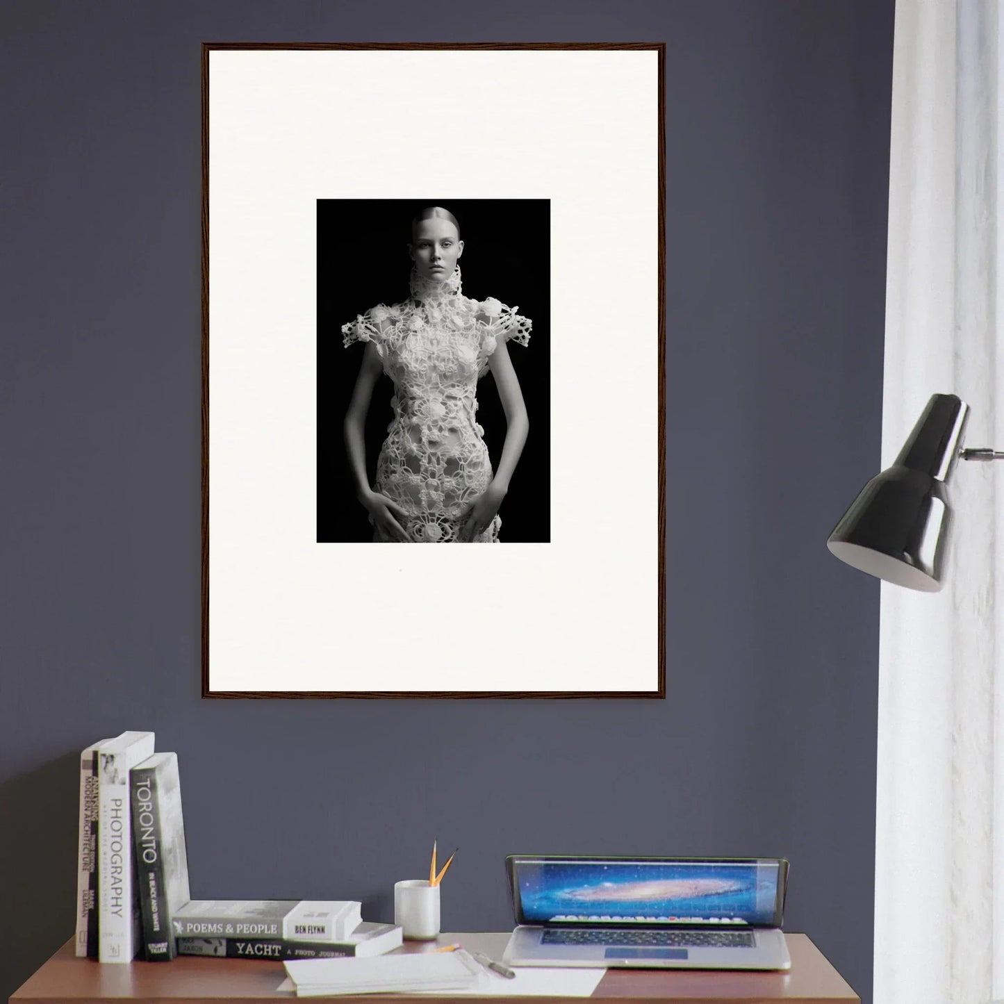 Framed black and white photograph featuring ornate floral dress for elegant room decor