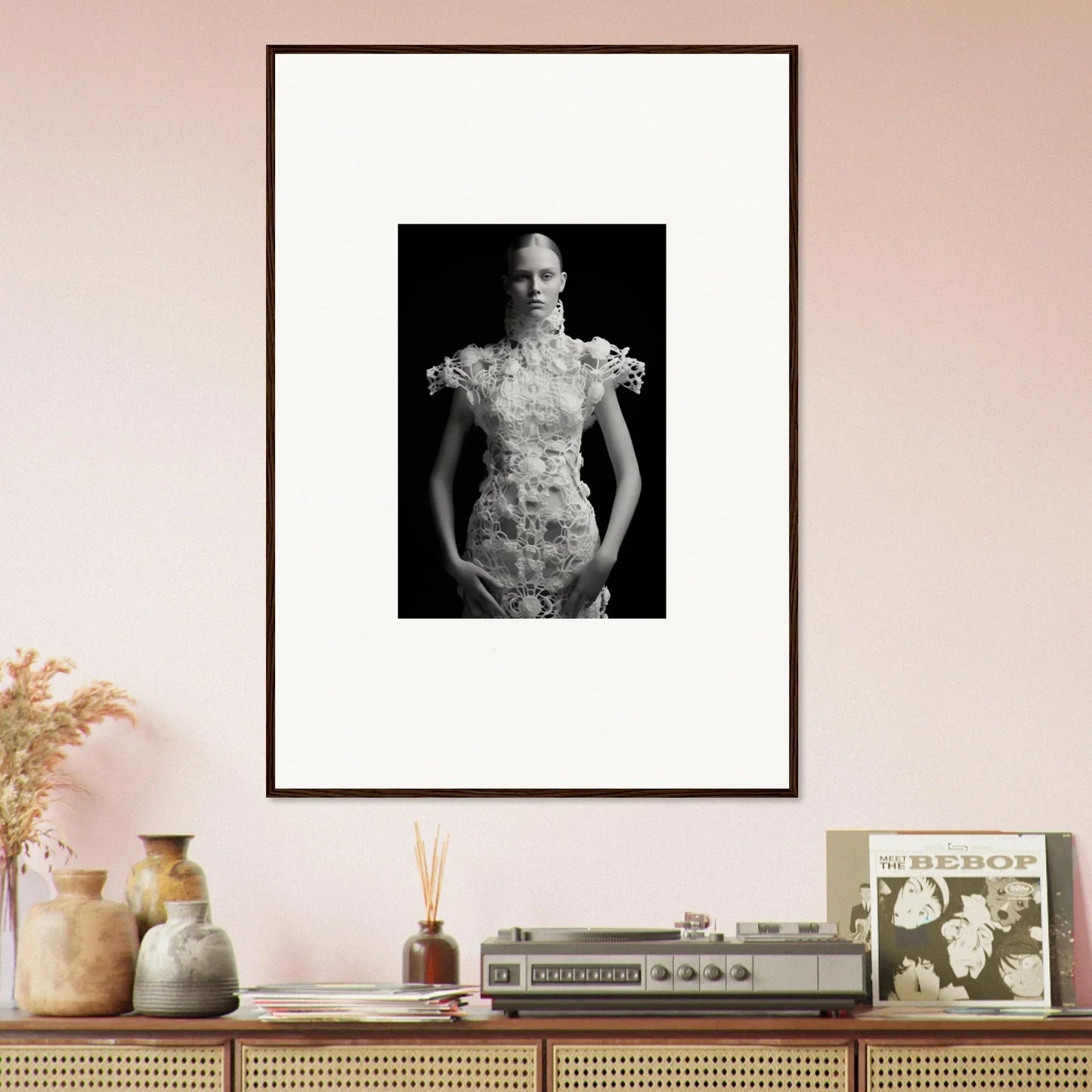 Framed black and white photograph of a person in a floral dress for room decor