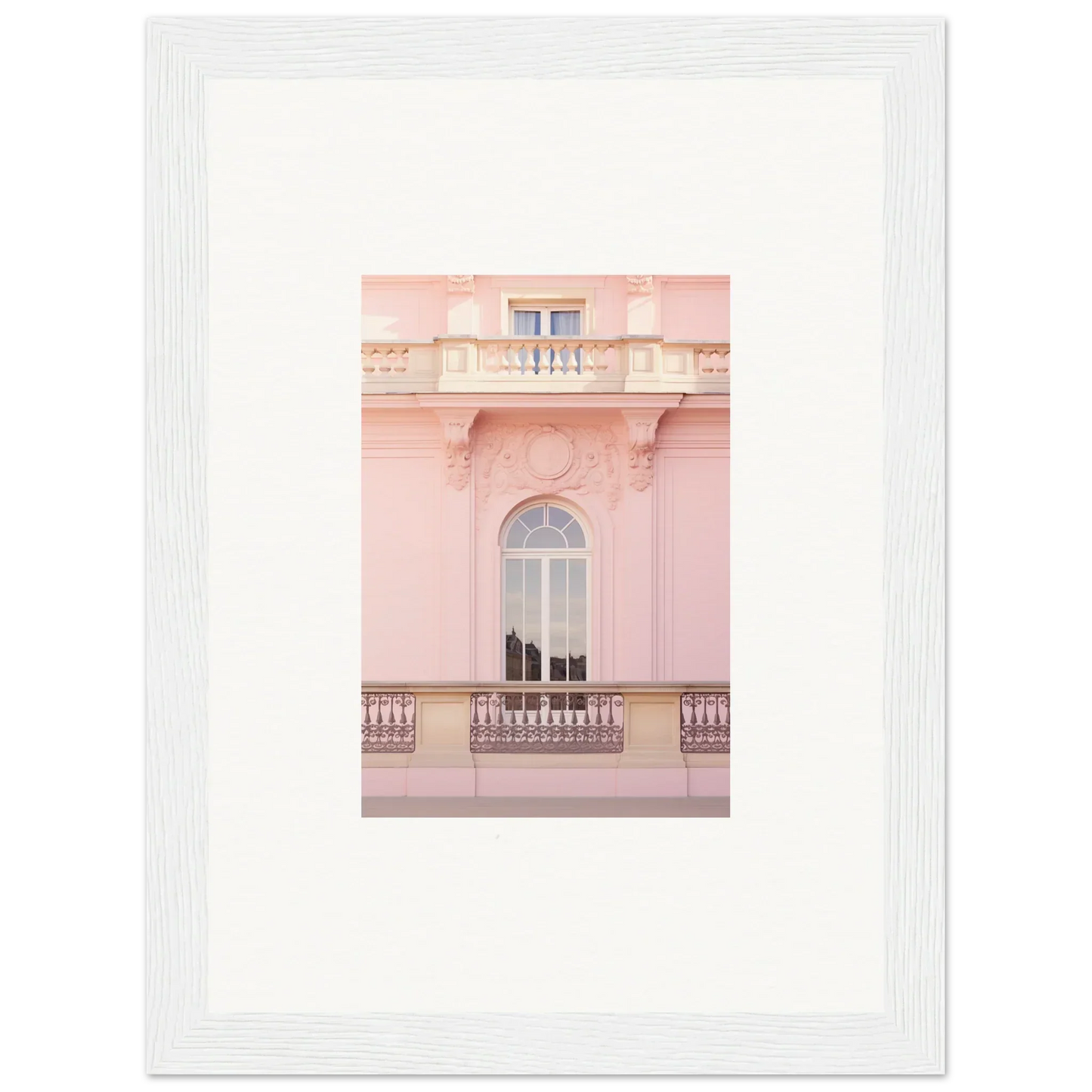 Pink building facade with arched window and ornate balcony for Ethereal Rose Whispers