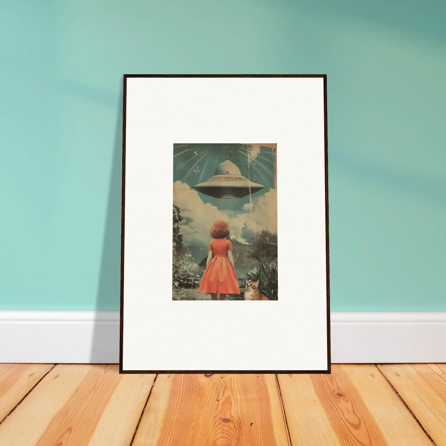 Framed wall art of a person in a red dress facing a UFO, unique room decor