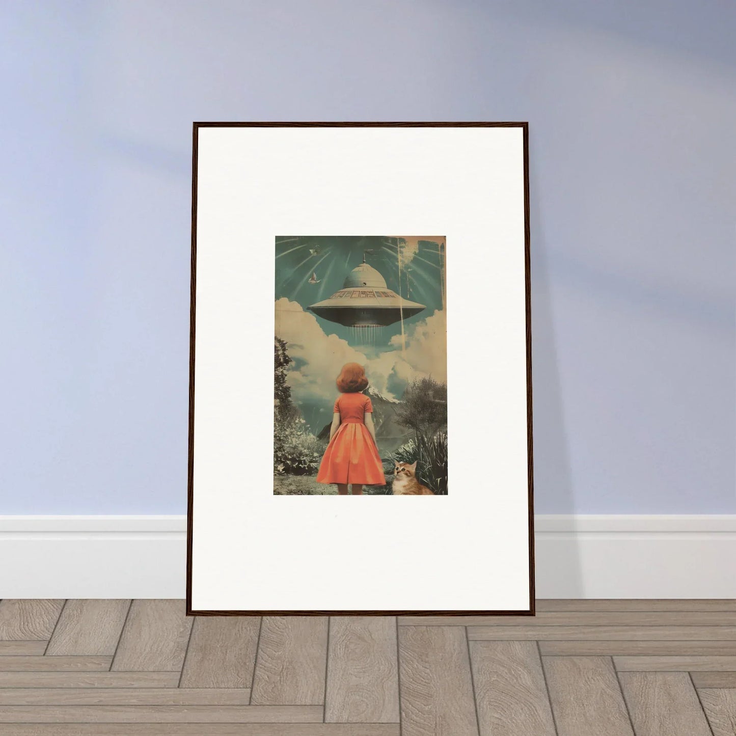 Framed wall art of a person in a red dress facing a UFO for unique room decor