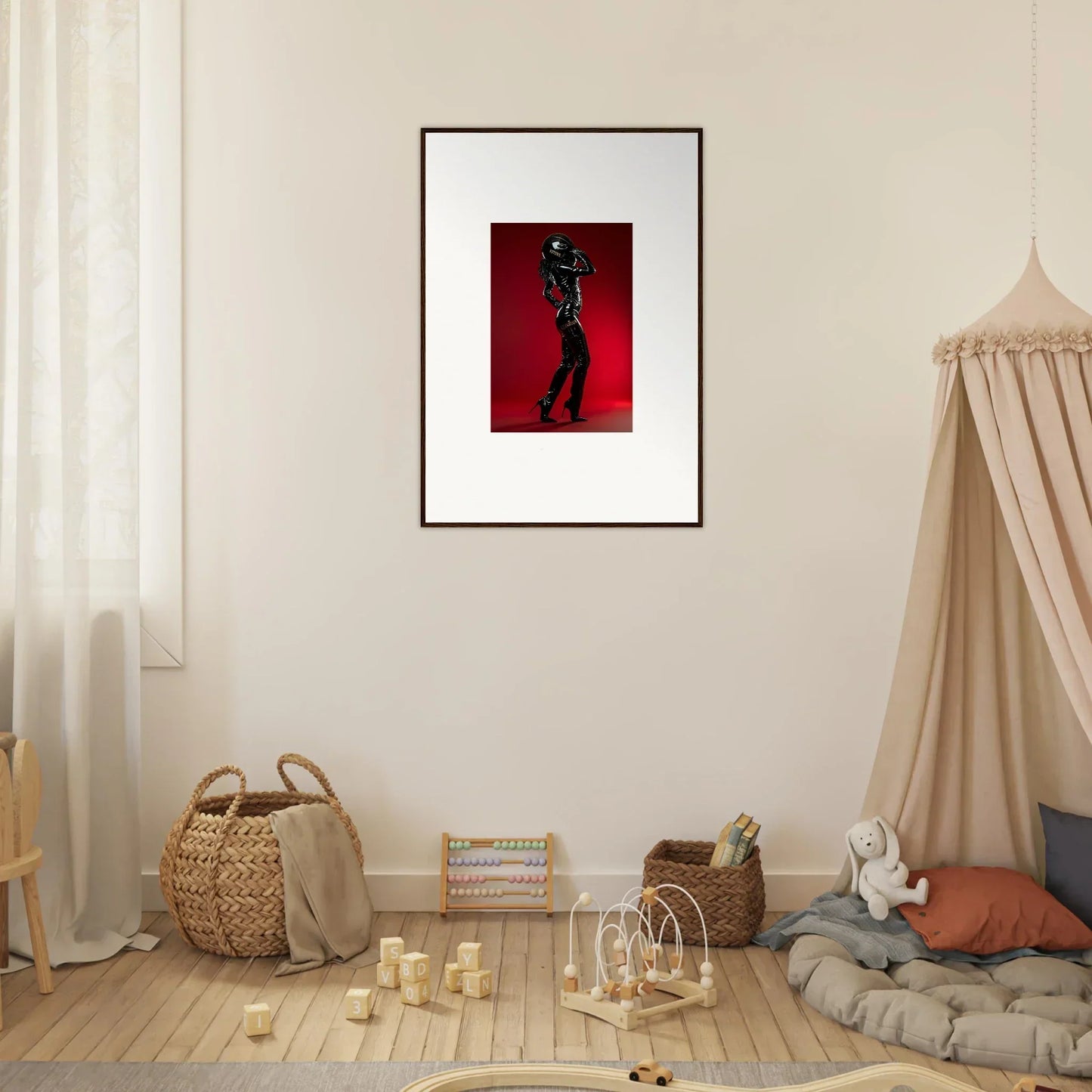 Framed artwork depicting a silhouetted figure against a red background.