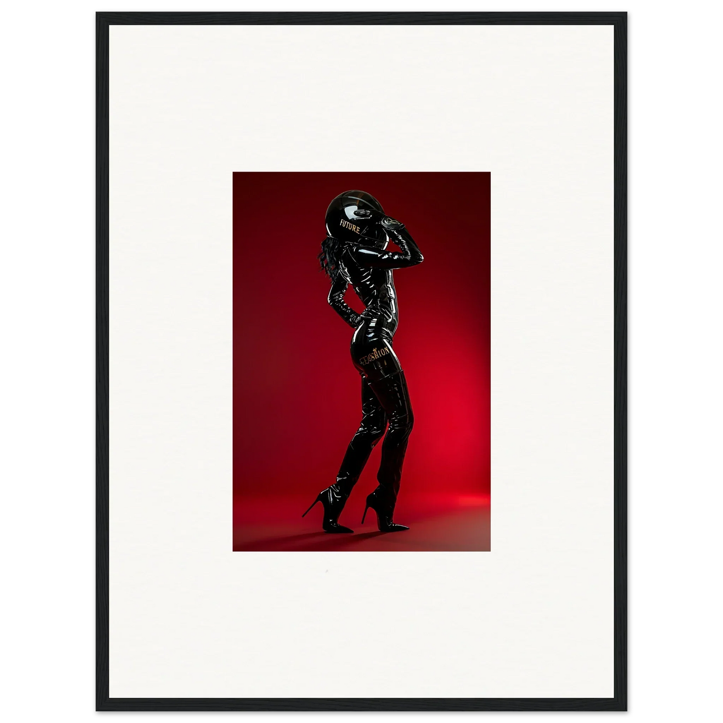 Figure in a shiny black latex or rubber bodysuit striking a pose against a red backdrop.