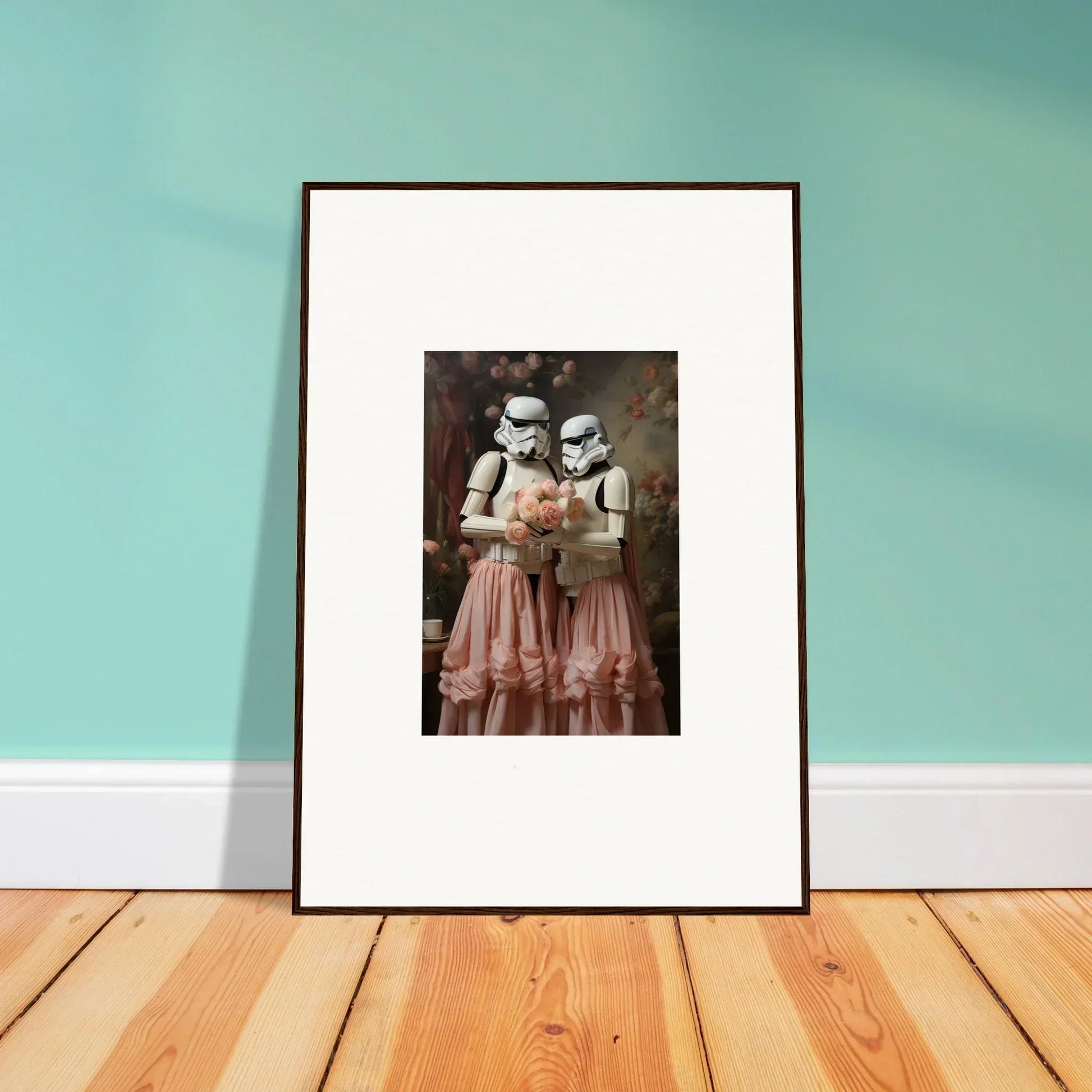 Framed artwork depicting two Stormtroopers from Star Wars wearing pink tutus.
