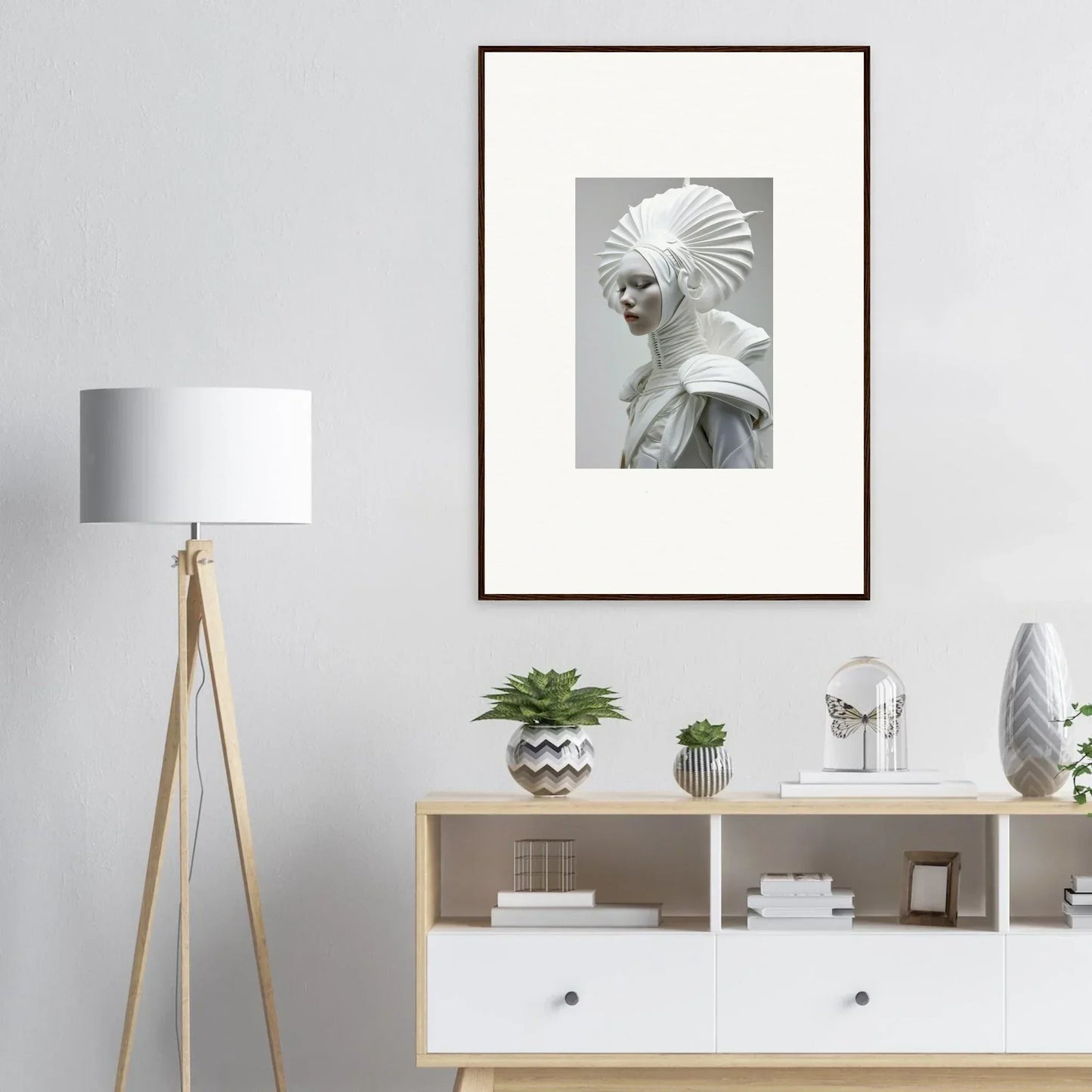 Framed black and white photograph featuring a person in an ivory halos headdress for room decor