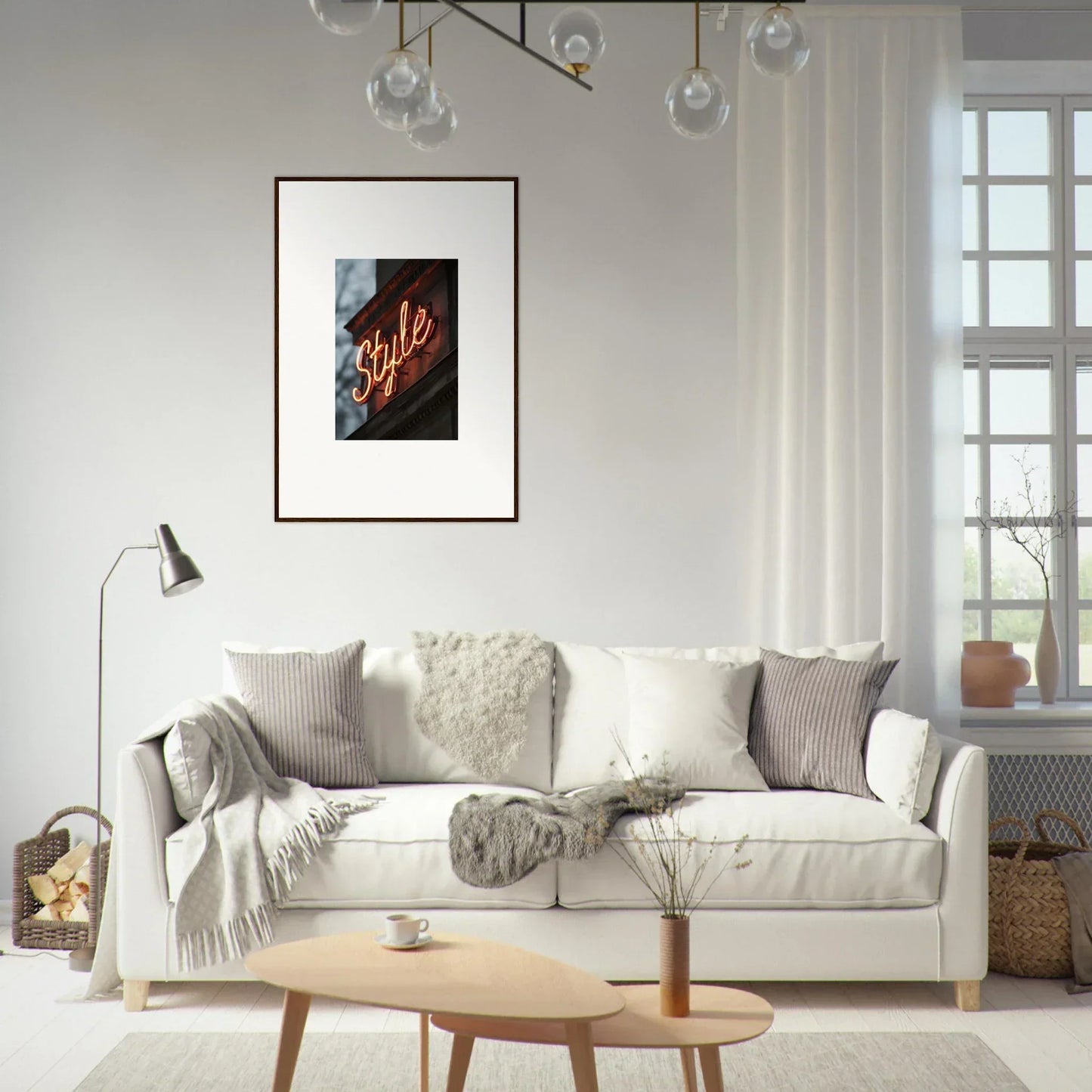 White sofa with cozy pillows and blankets in a stylish room decoration setting