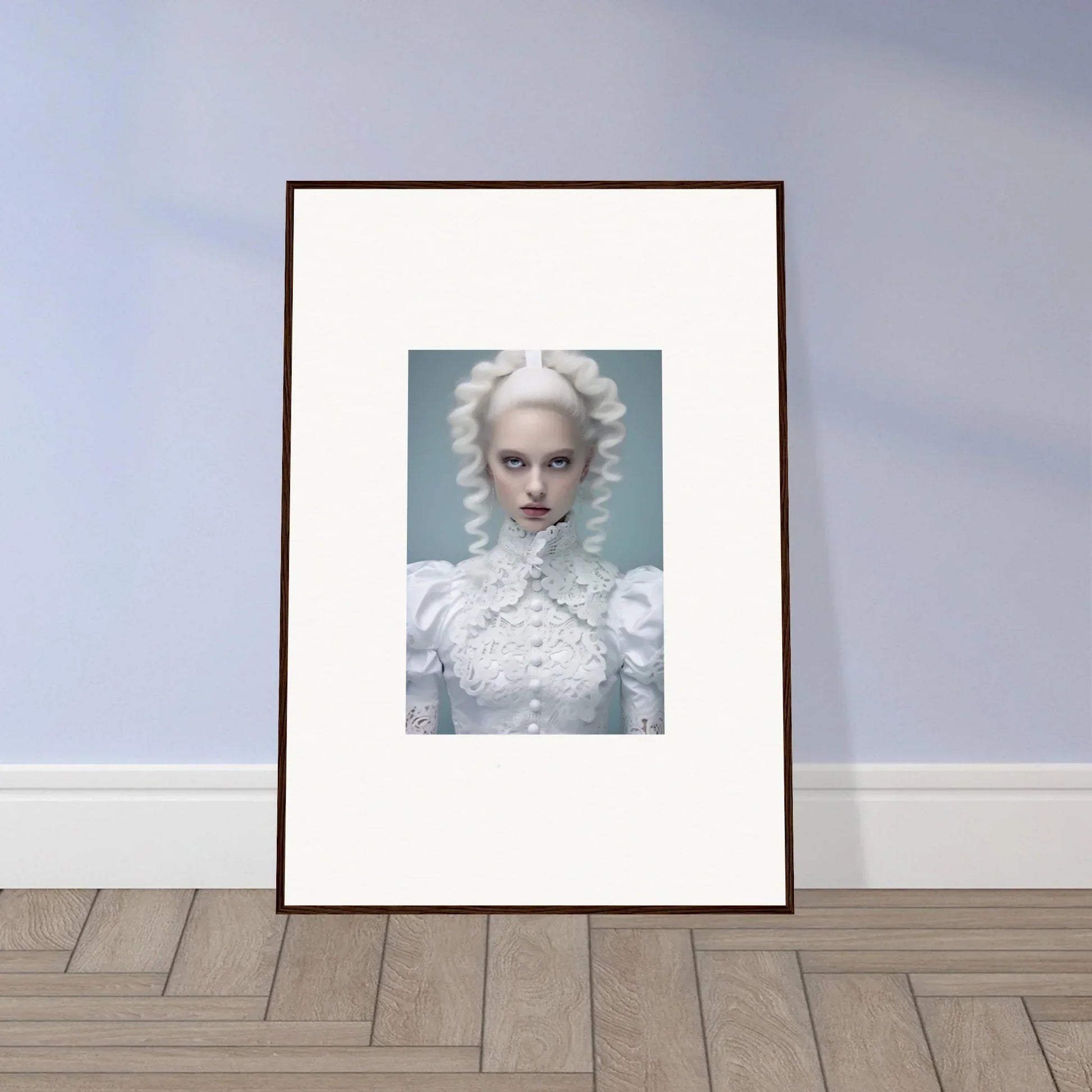Framed portrait of a person with white hair and pale makeup in a white high-collared outfit.