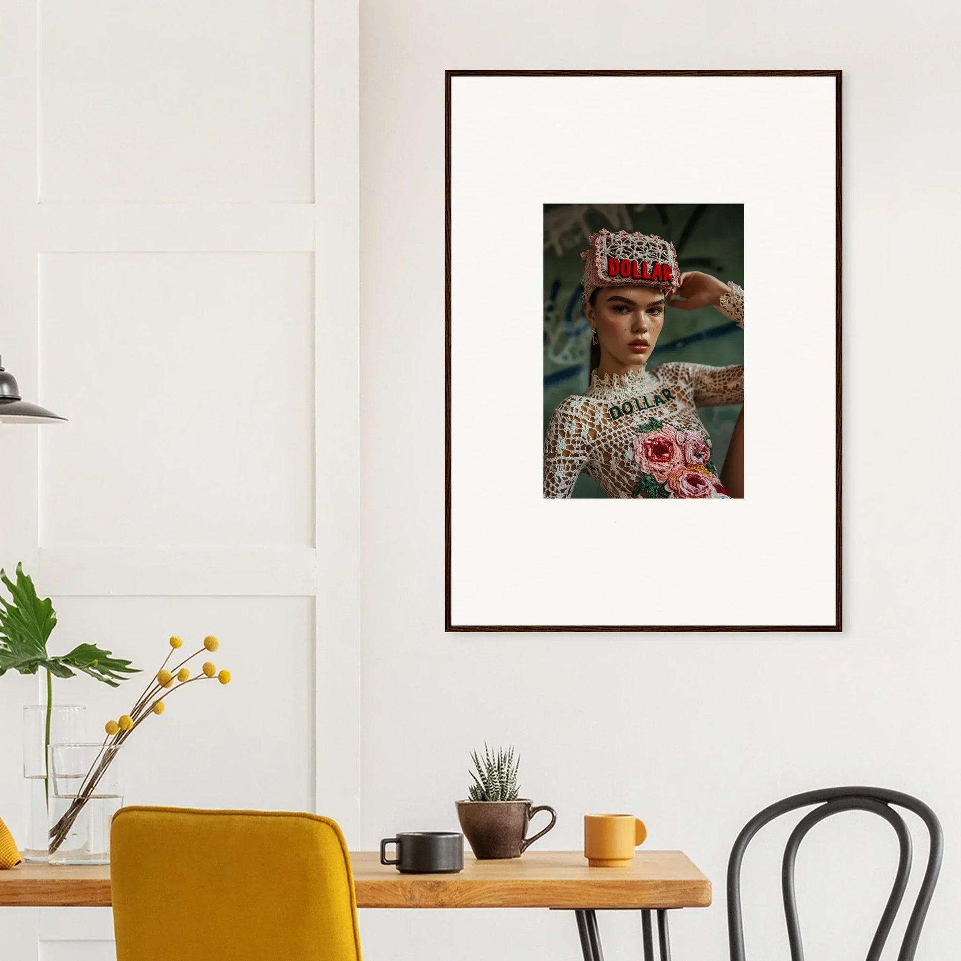 Framed wall art featuring a person in an ornate hat with flowers for elegant room decor