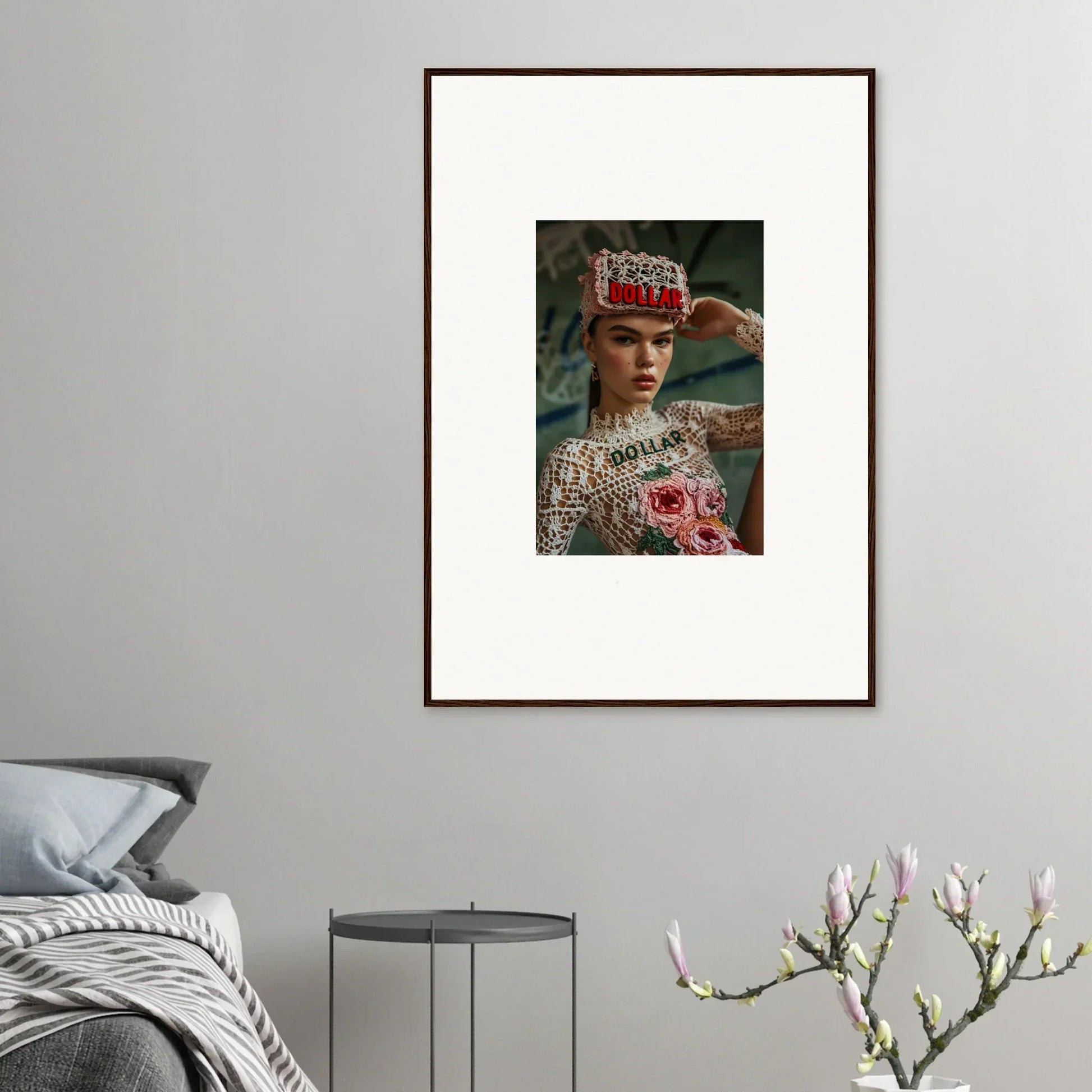 Framed wall art of a person in ornate headdress with pink flowers for Monet Bliss decor