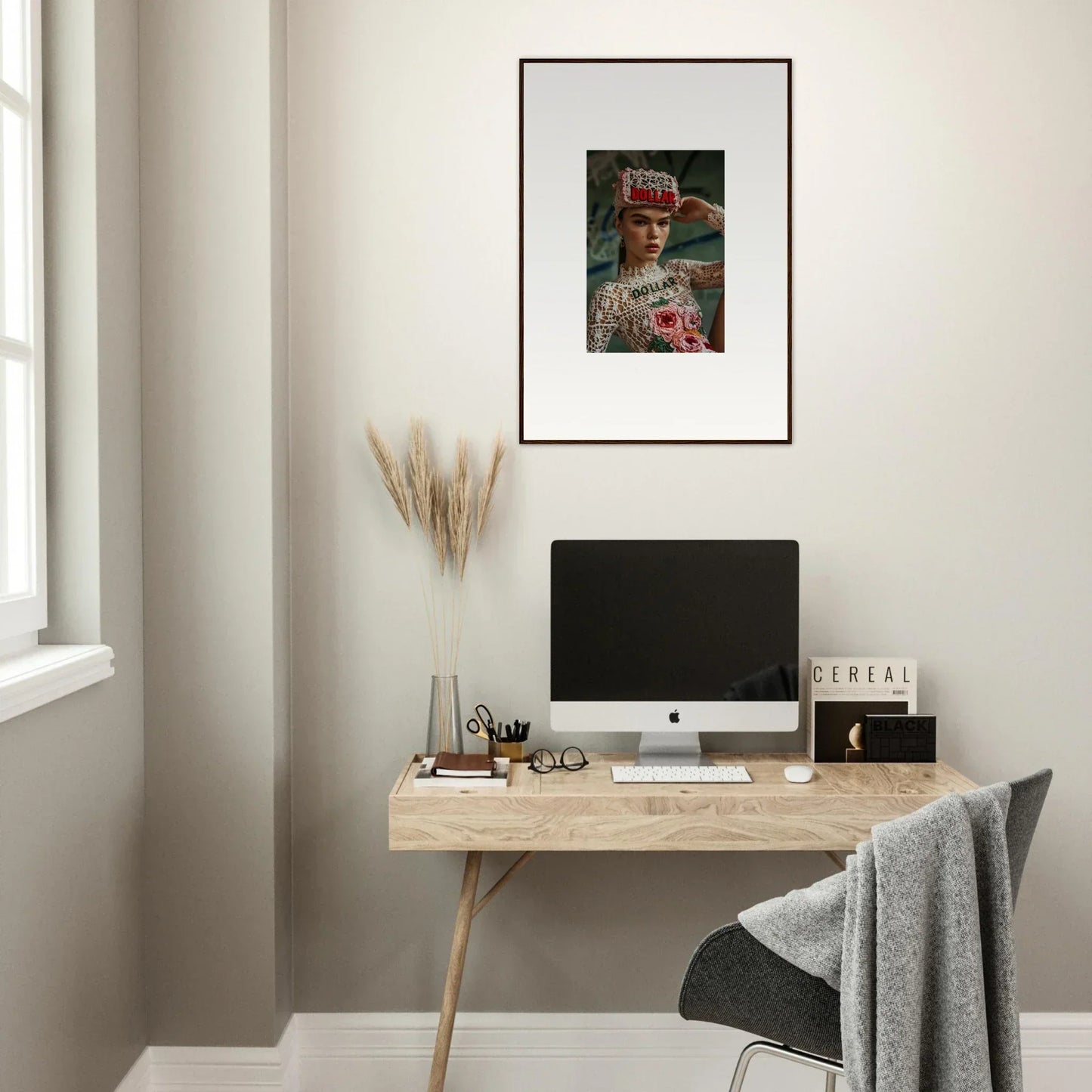 Minimalist wooden desk with computer monitor and Monet Bliss framed wall art above