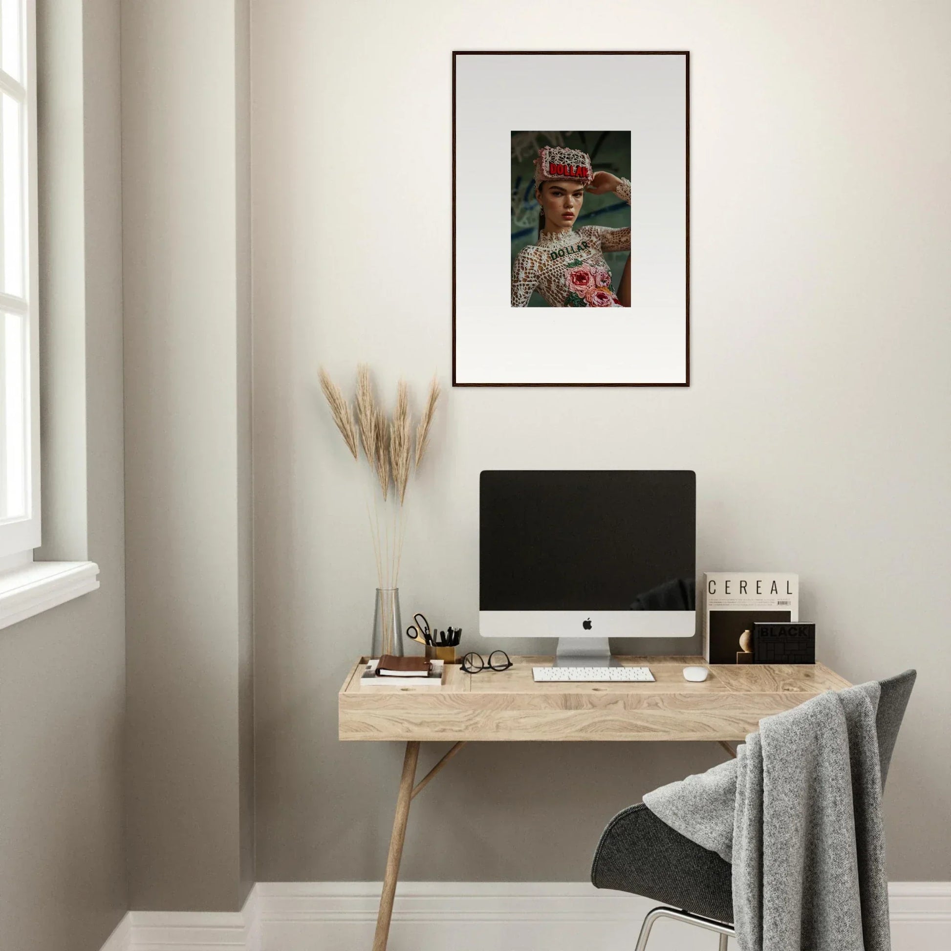 Minimalist wooden desk with computer monitor and Monet Bliss framed wall art above