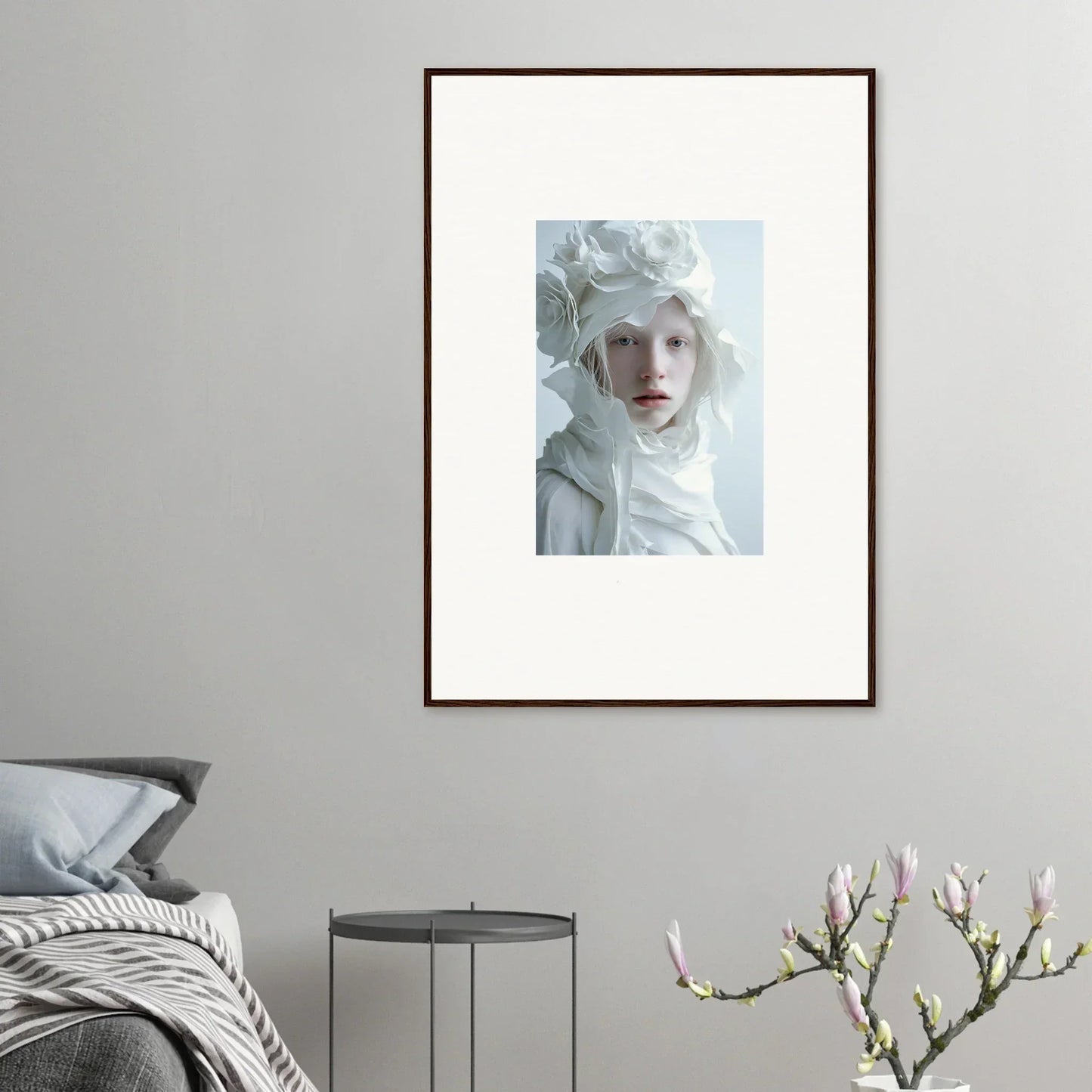 Framed wall art featuring a pale person in white fabric, perfect for room decor