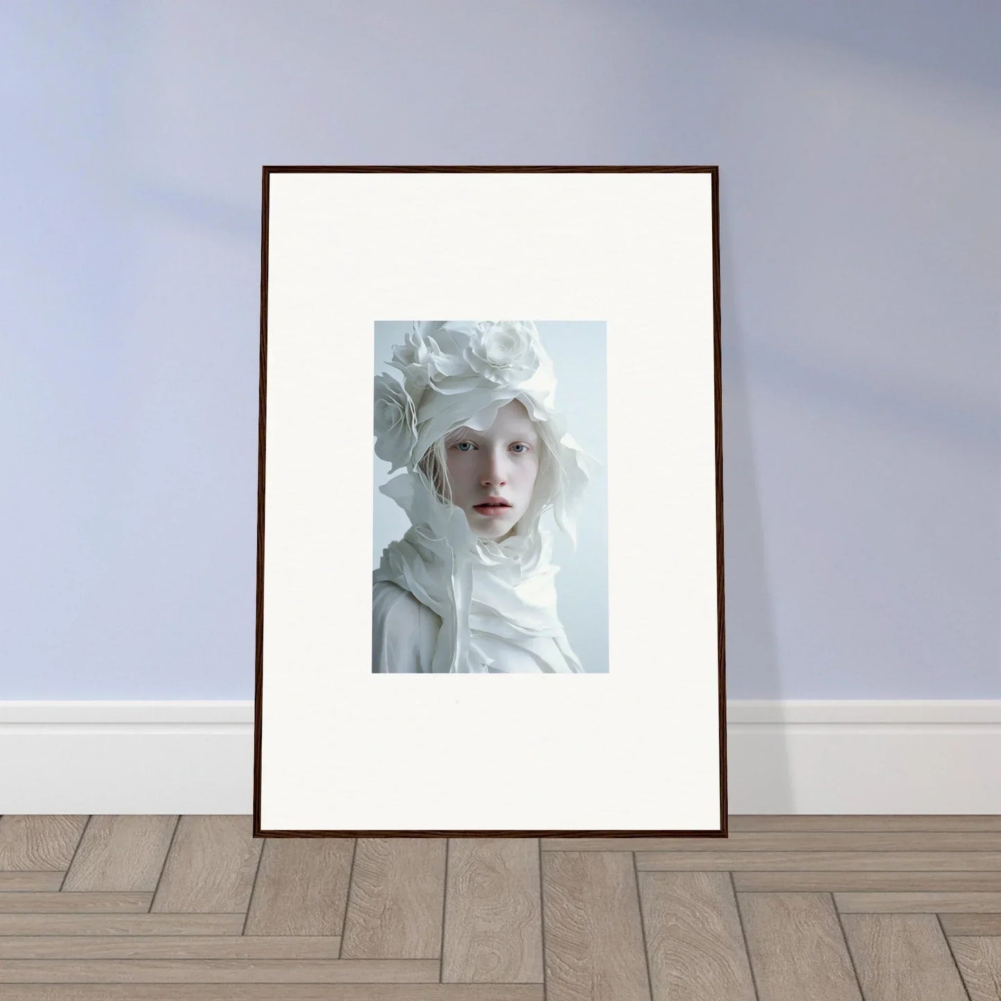 Framed wall art of a person with pale features and white hair for unique room decor