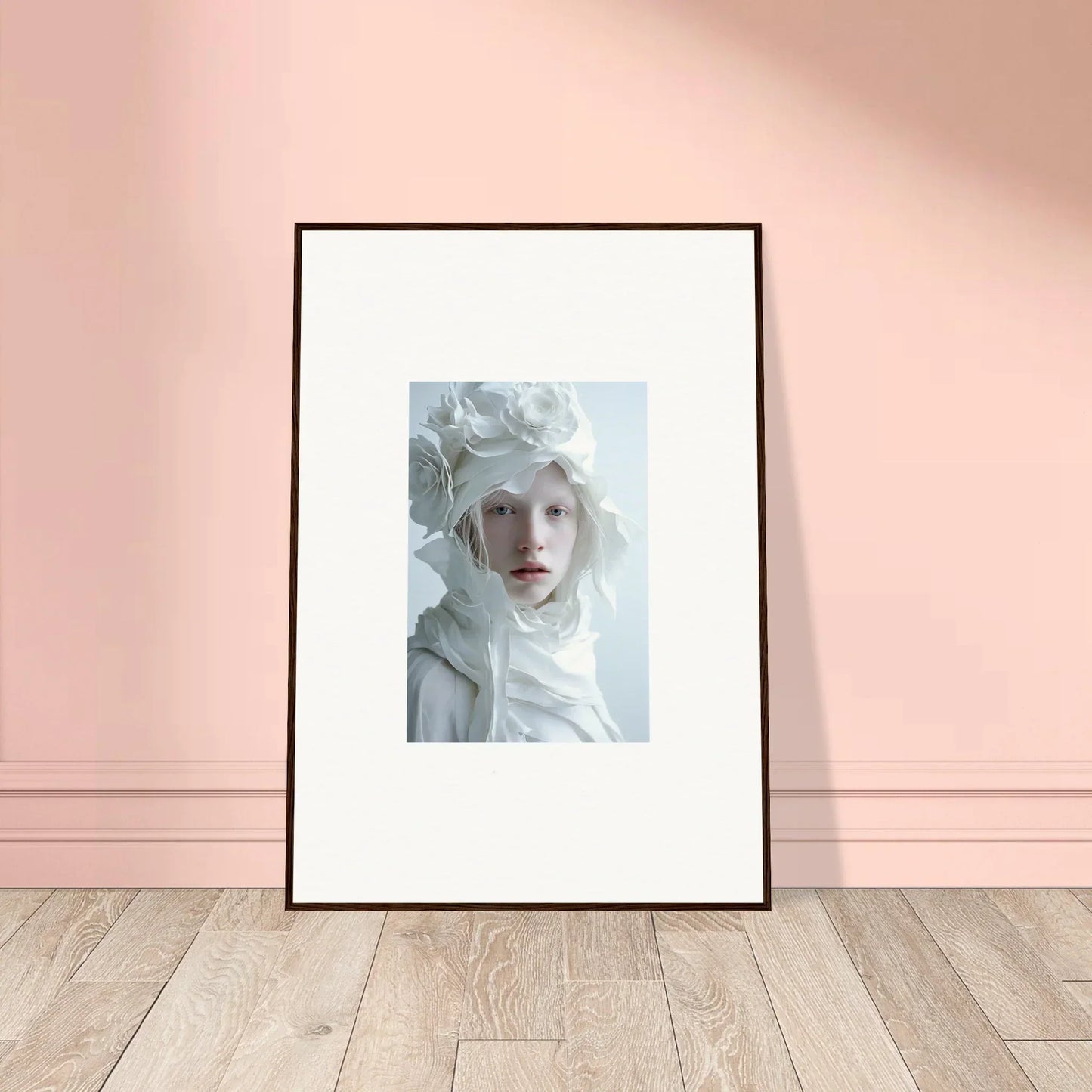 Framed wall art featuring a pale figure with white hair, perfect for room decor