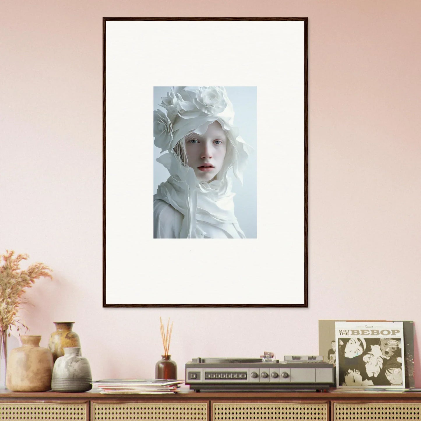 Framed portrait of a person with pale features, perfect for room decor or wall art