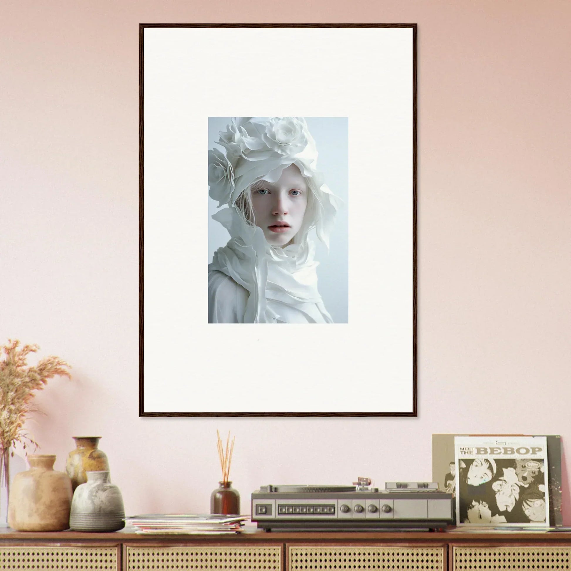 Framed portrait of a person with pale features, perfect for room decor or wall art