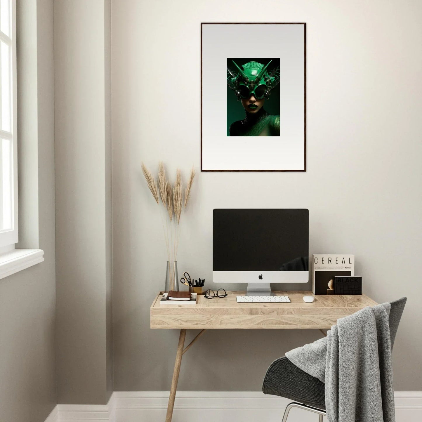 Minimalist home office with wooden desk, computer, and Nebula Empress framed wall art