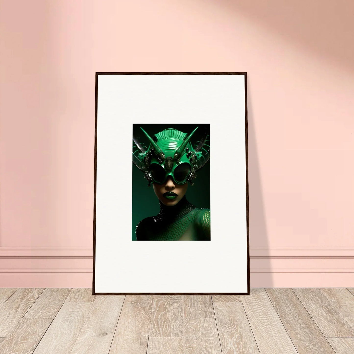 Framed wall art of a figure in a green headpiece, a stunning Nebula Empress design