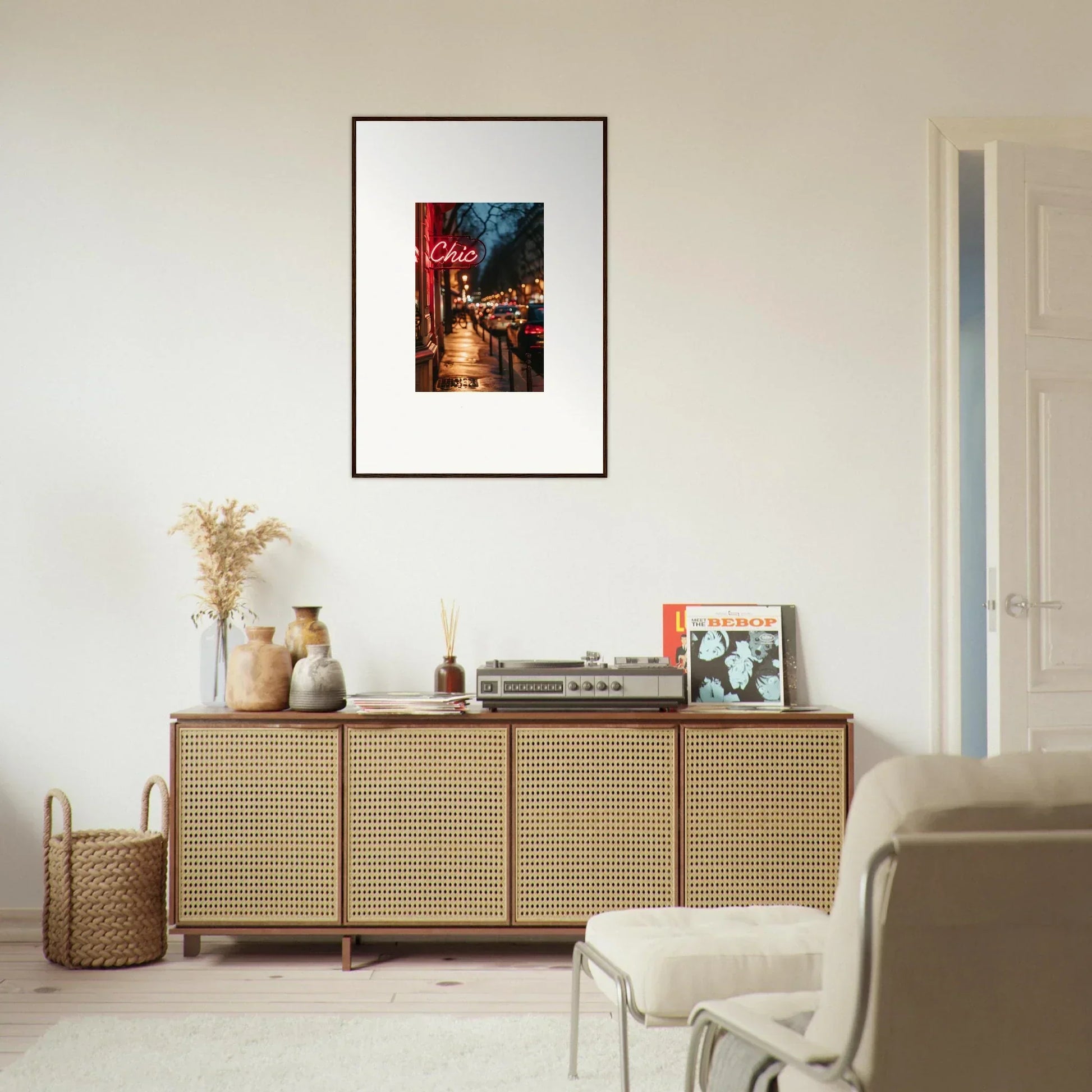 Stylish wooden sideboard with cane-webbed doors, perfect for room decoration