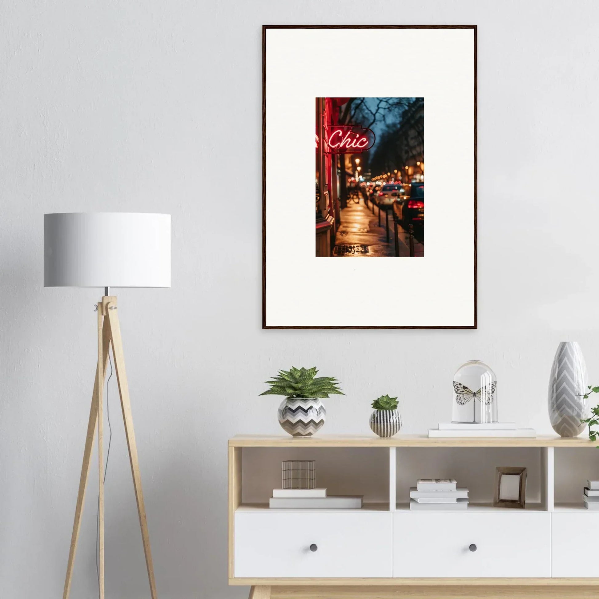 Framed wall art of a neon Chic sign on a city street for trendy room decoration