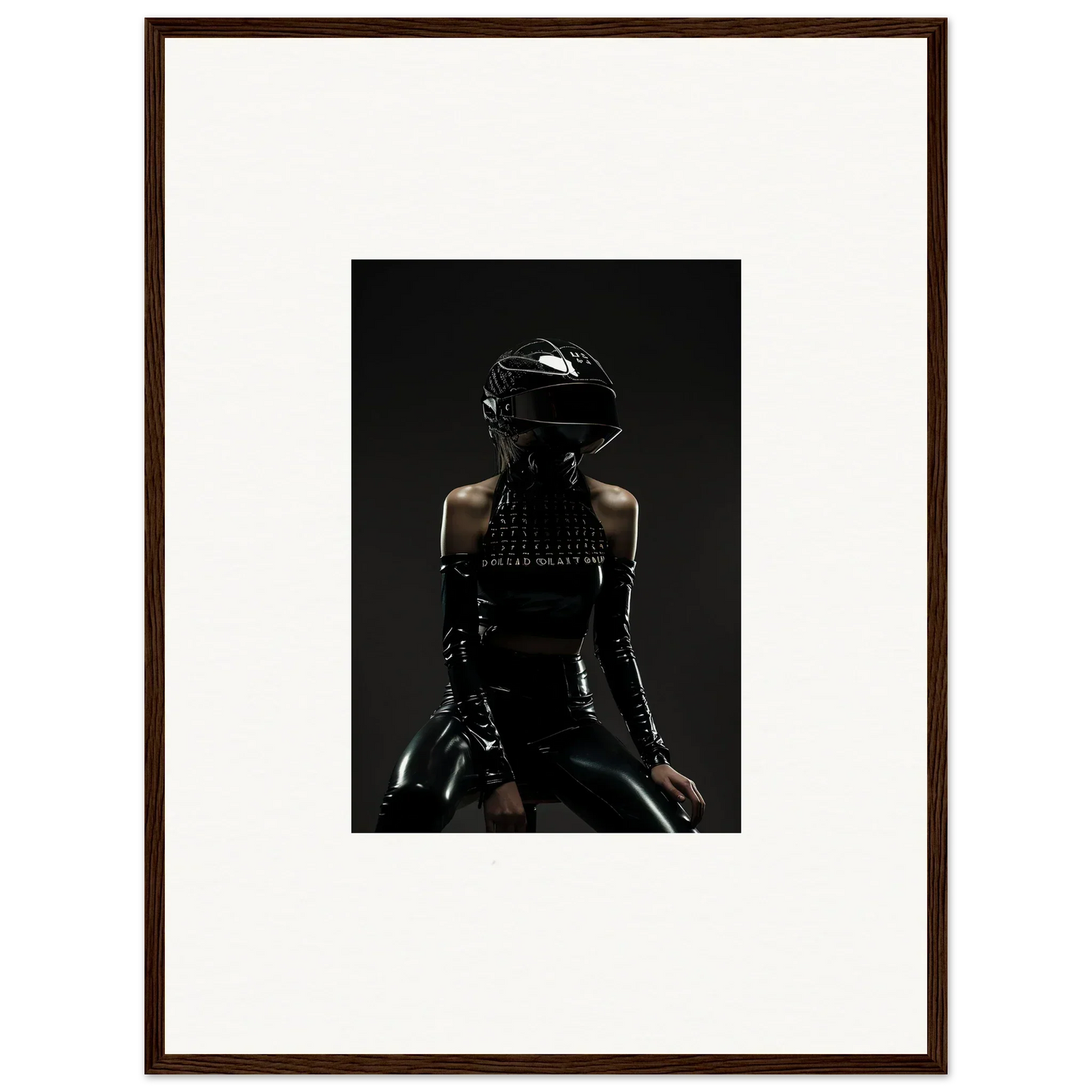 Framed photograph of a person wearing a black helmet and dark clothing in a shadowy, dramatic pose.