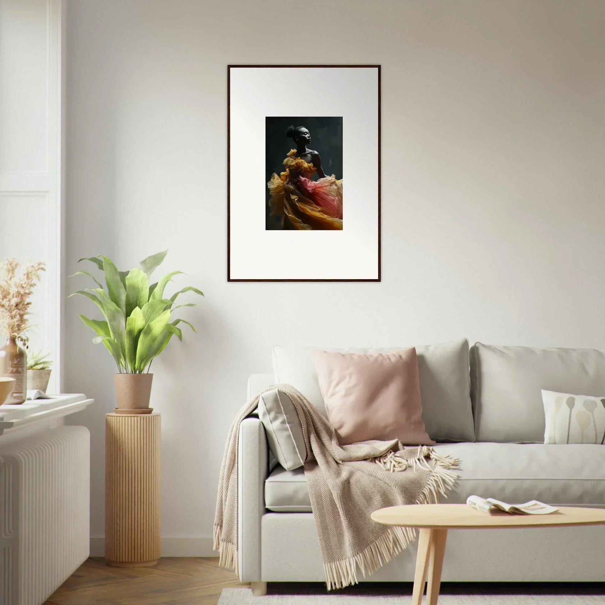 Framed artwork depicting a figure in ornate historical clothing.