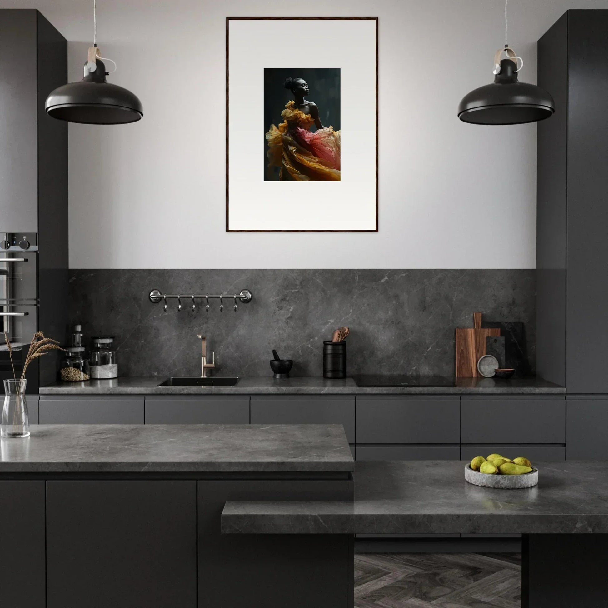 Modern, sleek kitchen with dark cabinetry and a framed artwork on the wall.