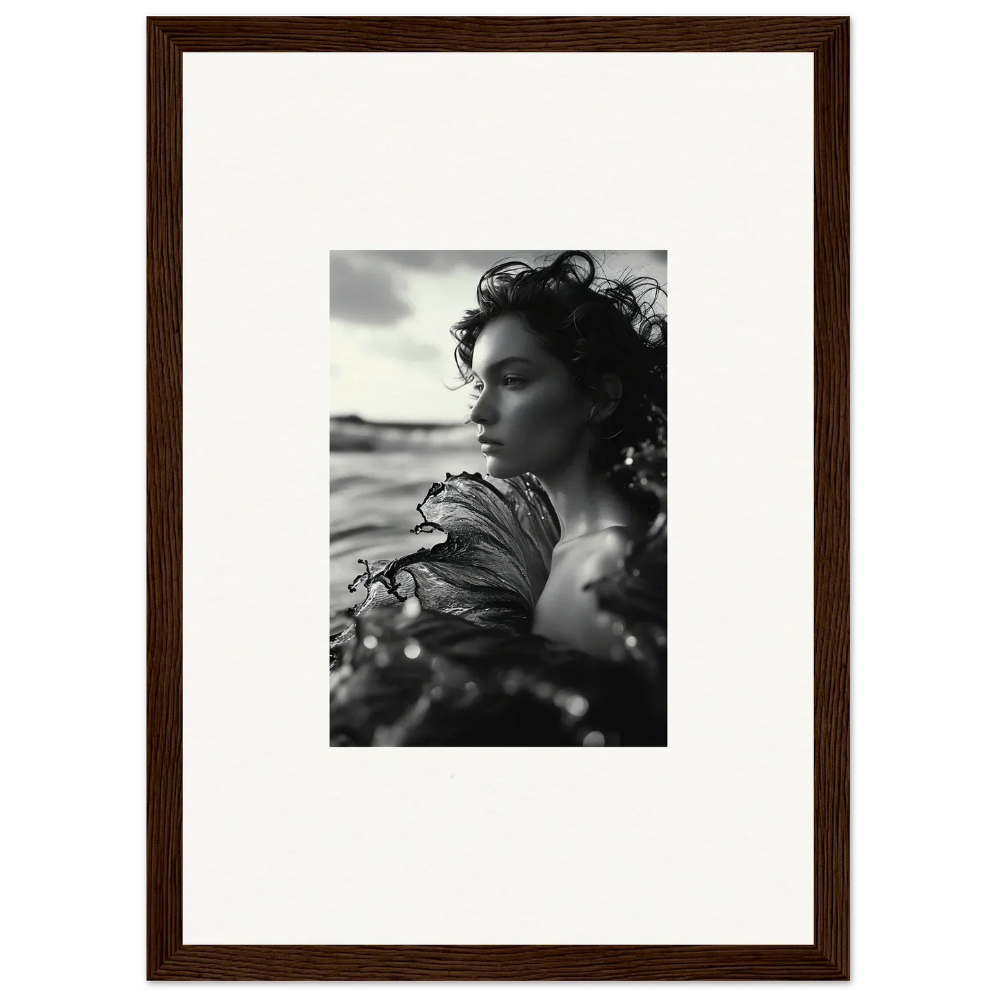 Black and white portrait of a woman with windswept hair for a sea reverie canvas print