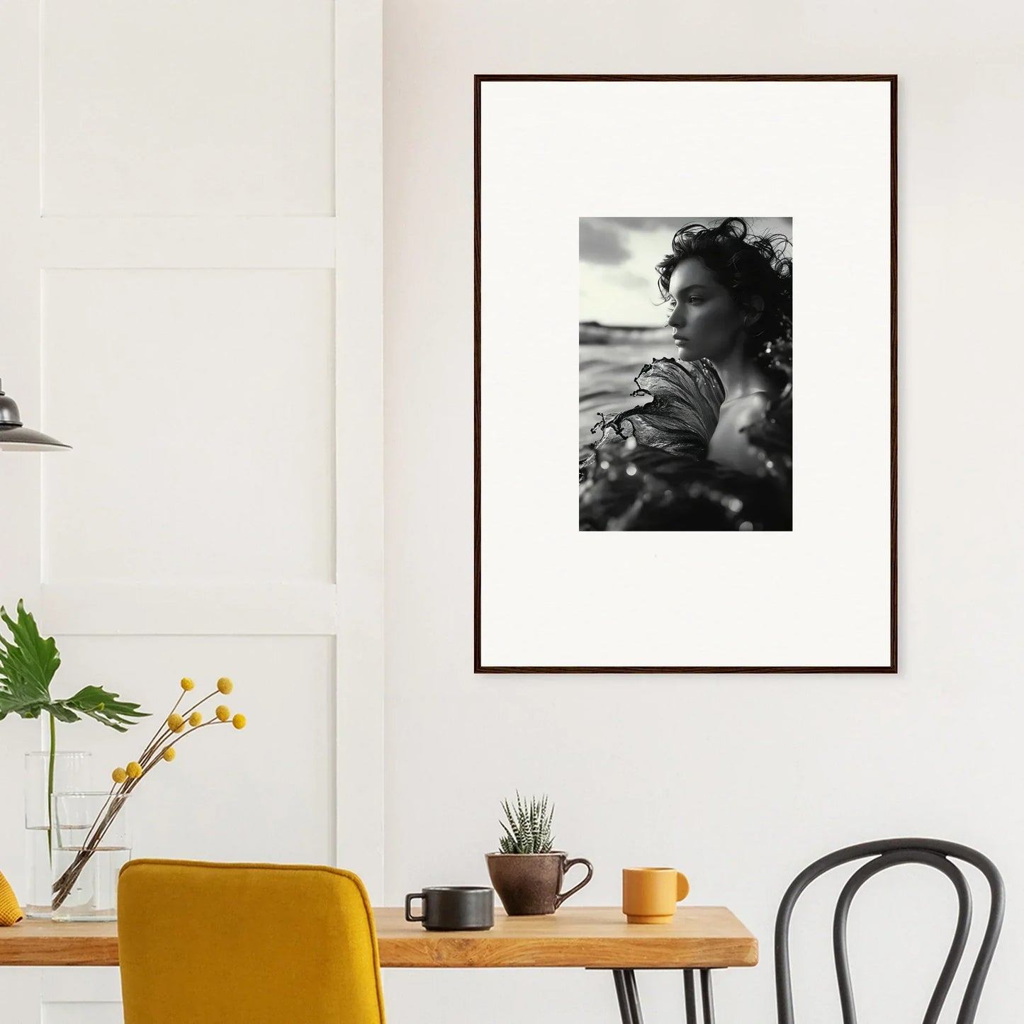 Framed black and white photo of a person in a sea reverie for room decoration
