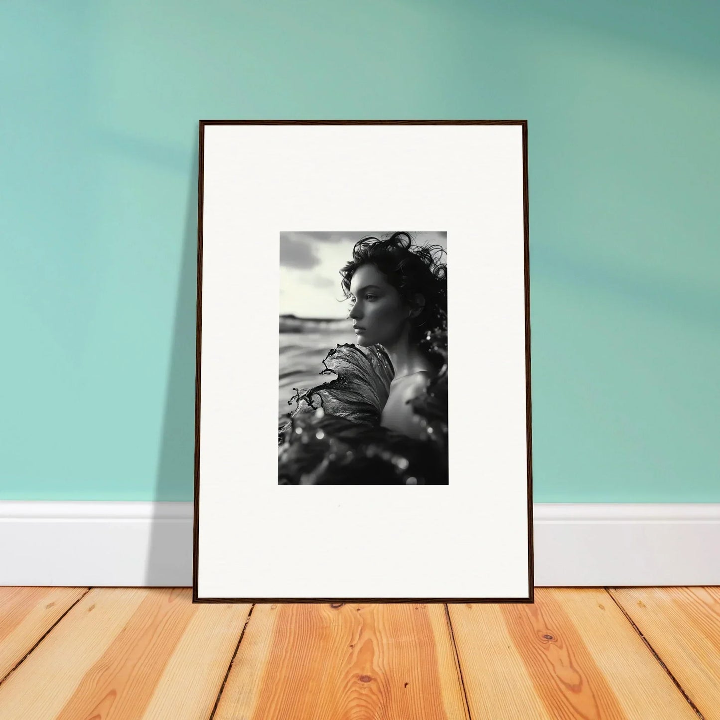 Framed black and white canvas print of a person in a sea reverie for room decoration