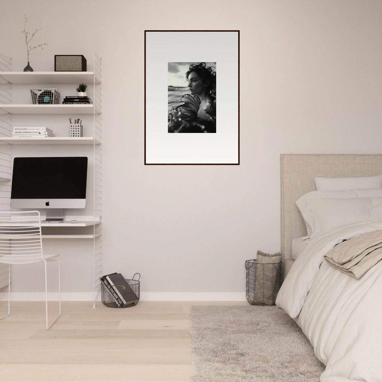 Minimalist bedroom featuring a stylish black and white canvas print for room decoration