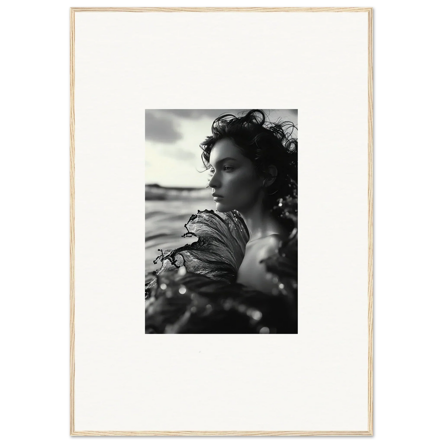 Black and white profile photo of a woman with windswept hair for sea reverie canvas print