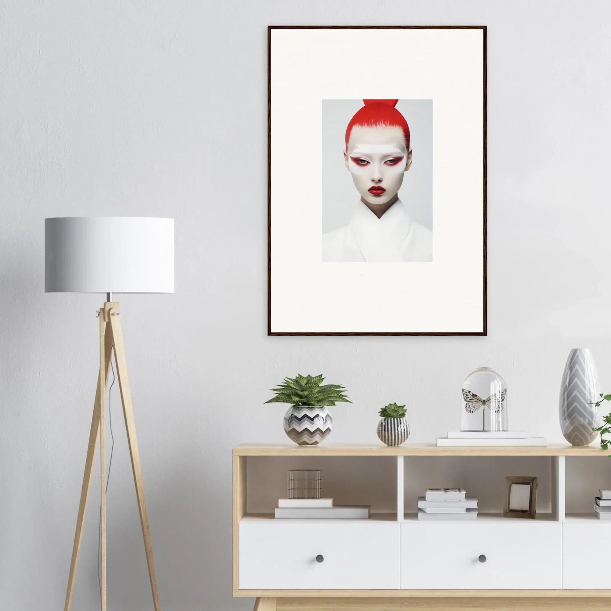 Framed wall art featuring a person with red hair and white face makeup for unique room decor