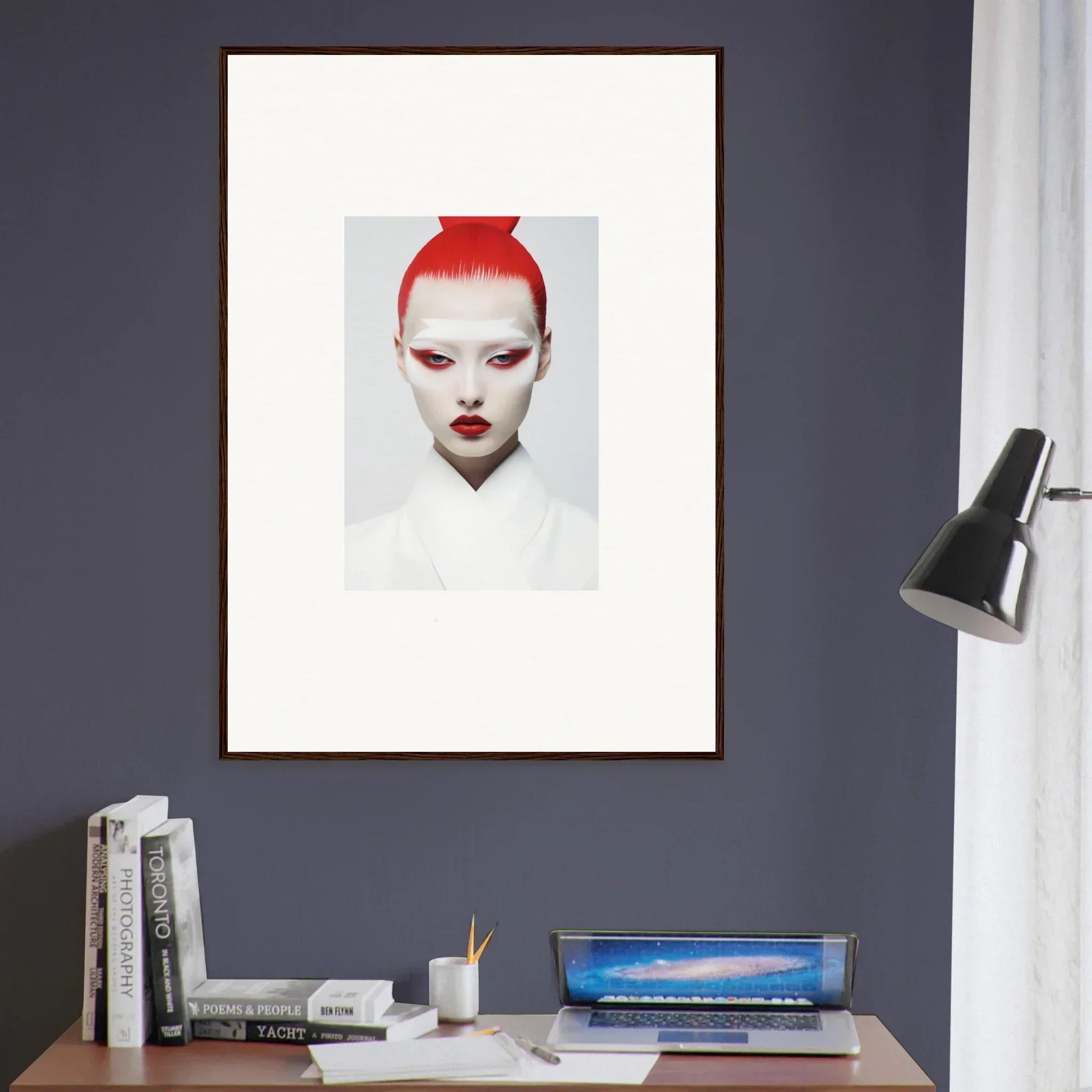 Framed wall art featuring a striking red-haired portrait on a white background
