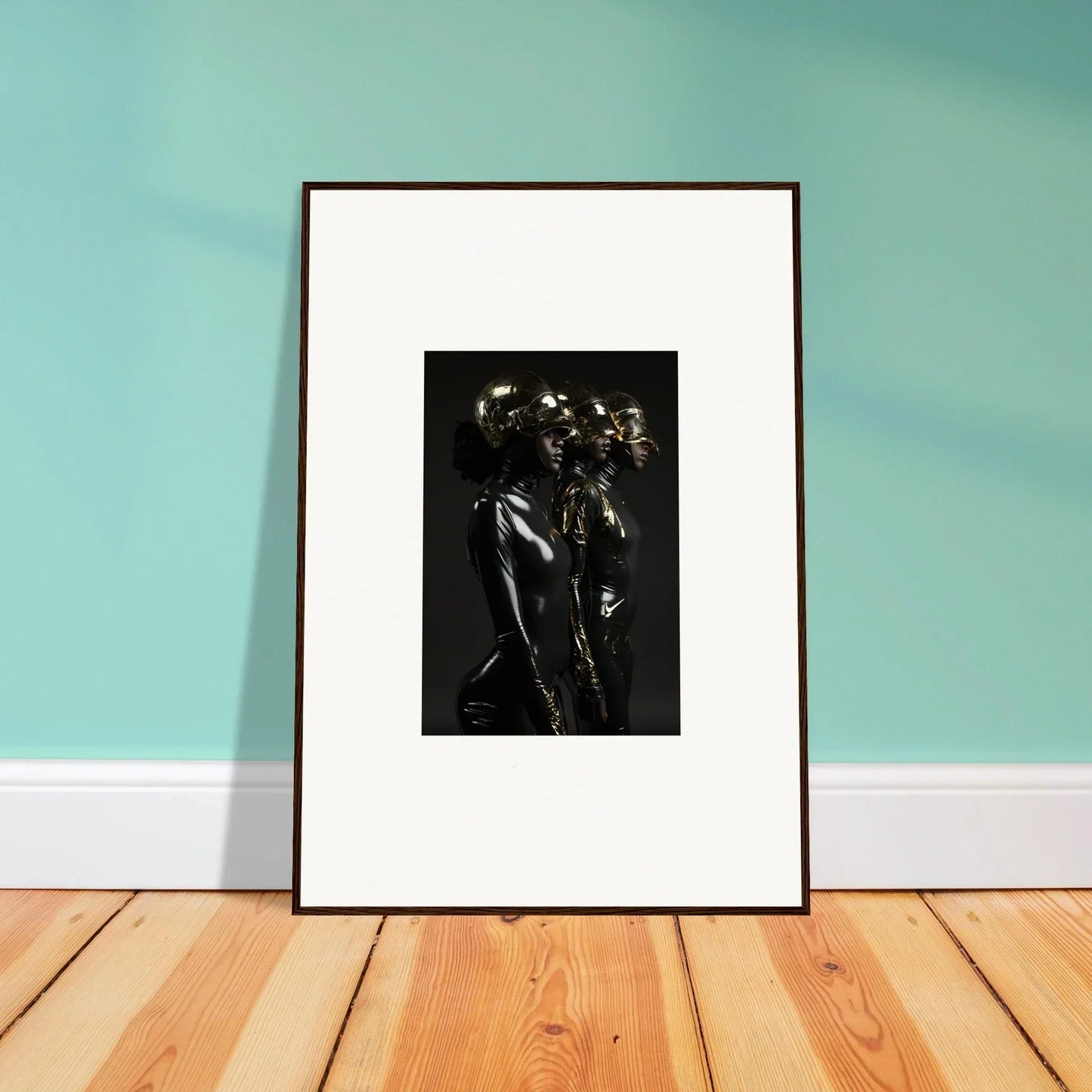 Framed black and white photograph of a figure with flowers on their head.