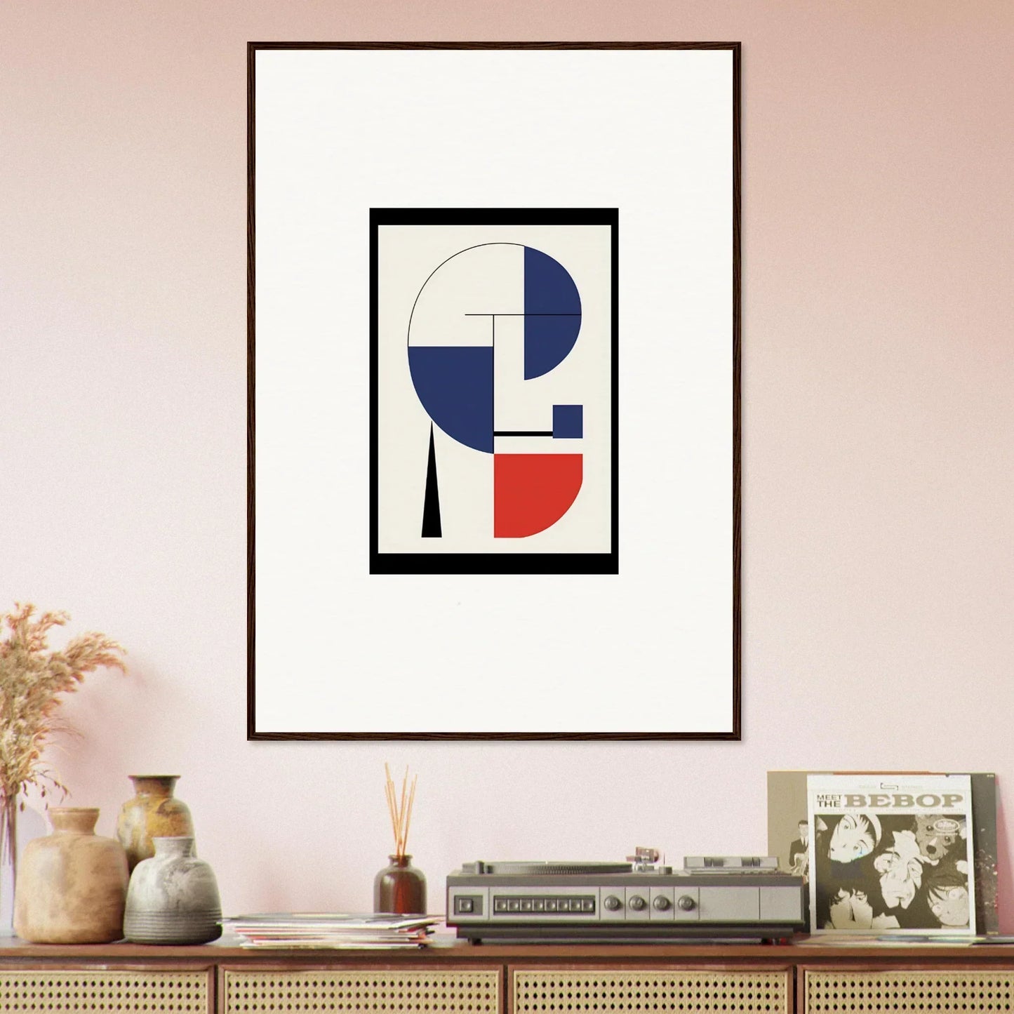 Framed wall art featuring blue, red, and white geometric shapes in Prism Mirage design