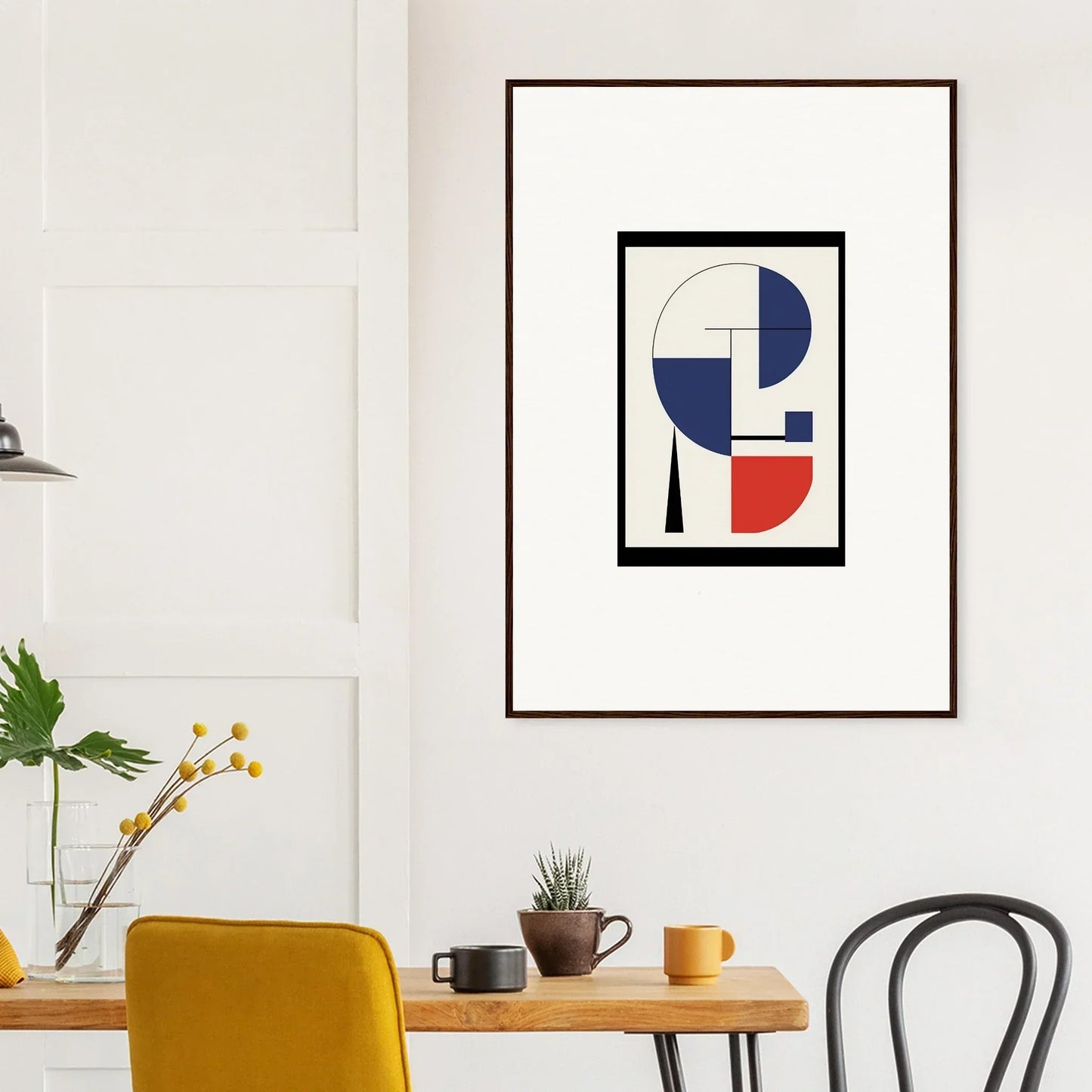 Framed wall art with blue, red, and white geometric shapes for stylish room decor