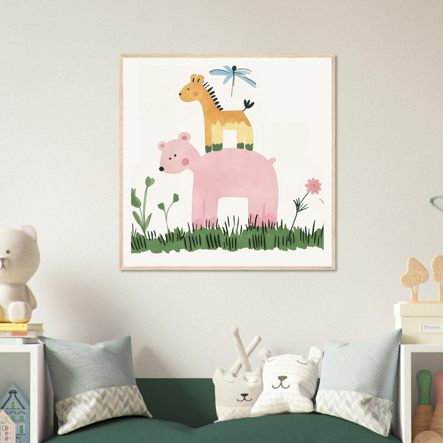 Framed nursery art print of pink elephant, giraffe, and dragonfly in grassy setting