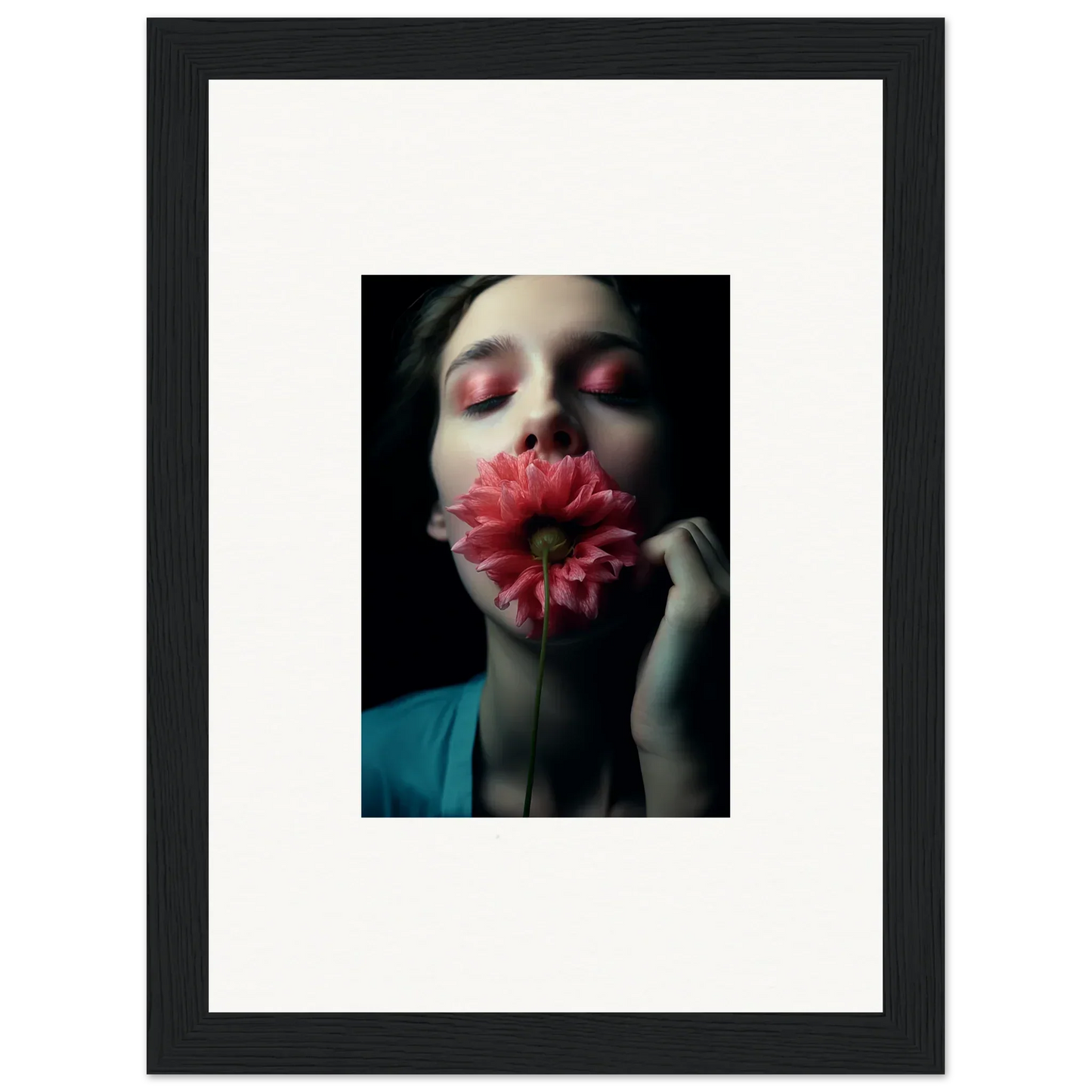 Person with a pink gerbera daisy for wall art in a stylish room decoration