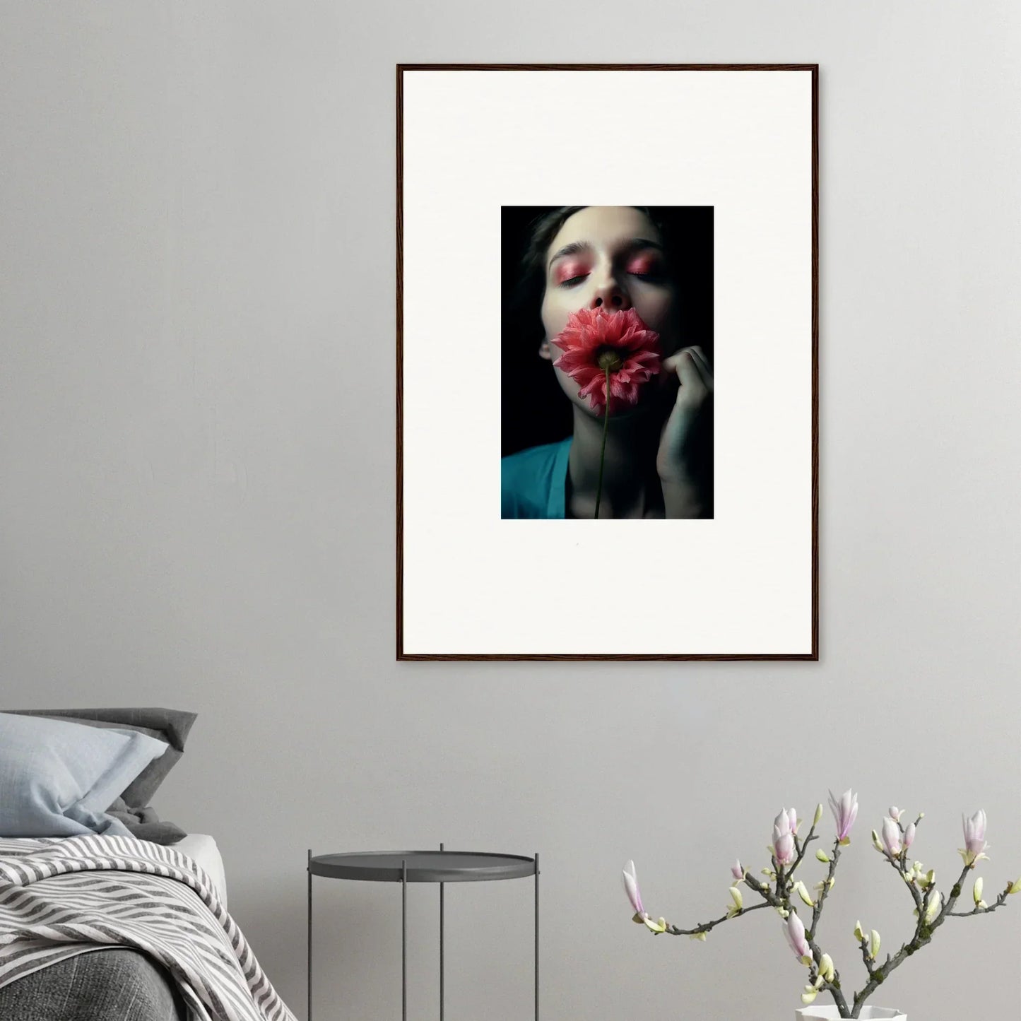 Framed canvas print of someone with a red flower for cool wall art and room decoration
