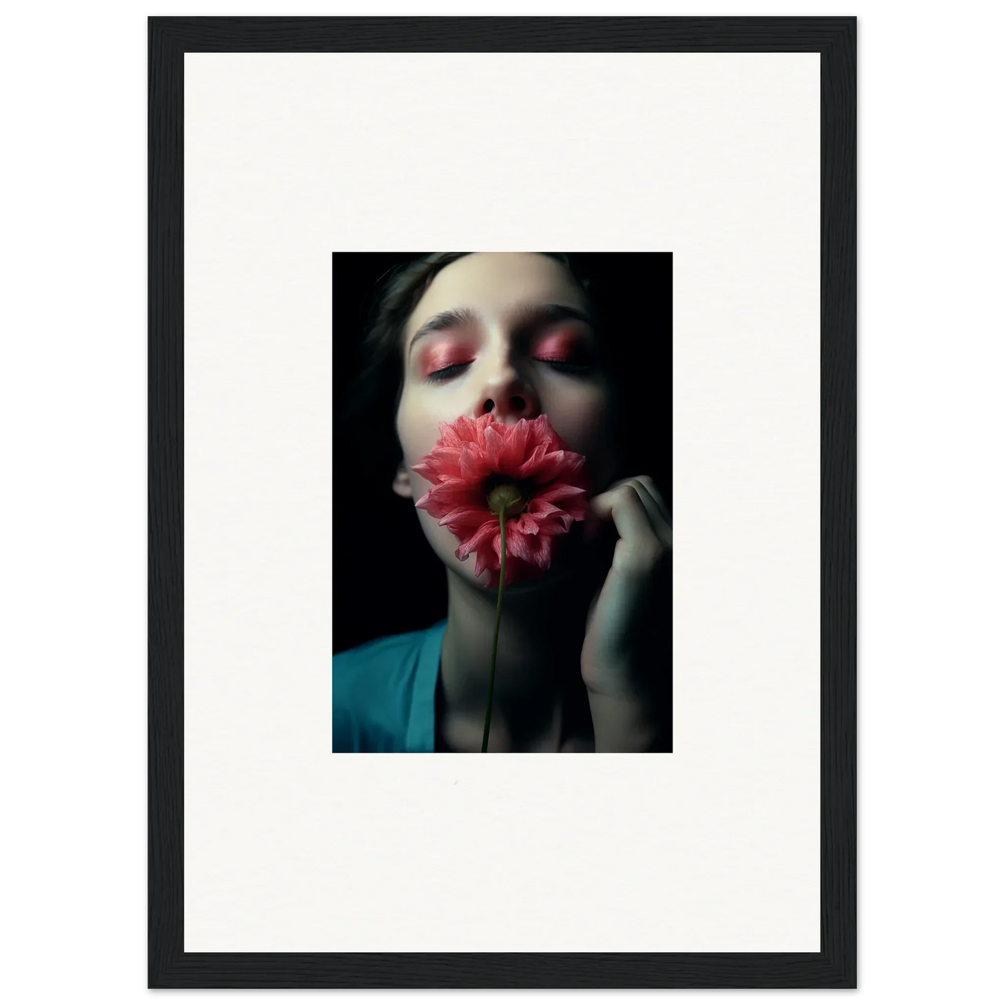 Framed canvas print of a person with a pink flower, perfect for room decoration