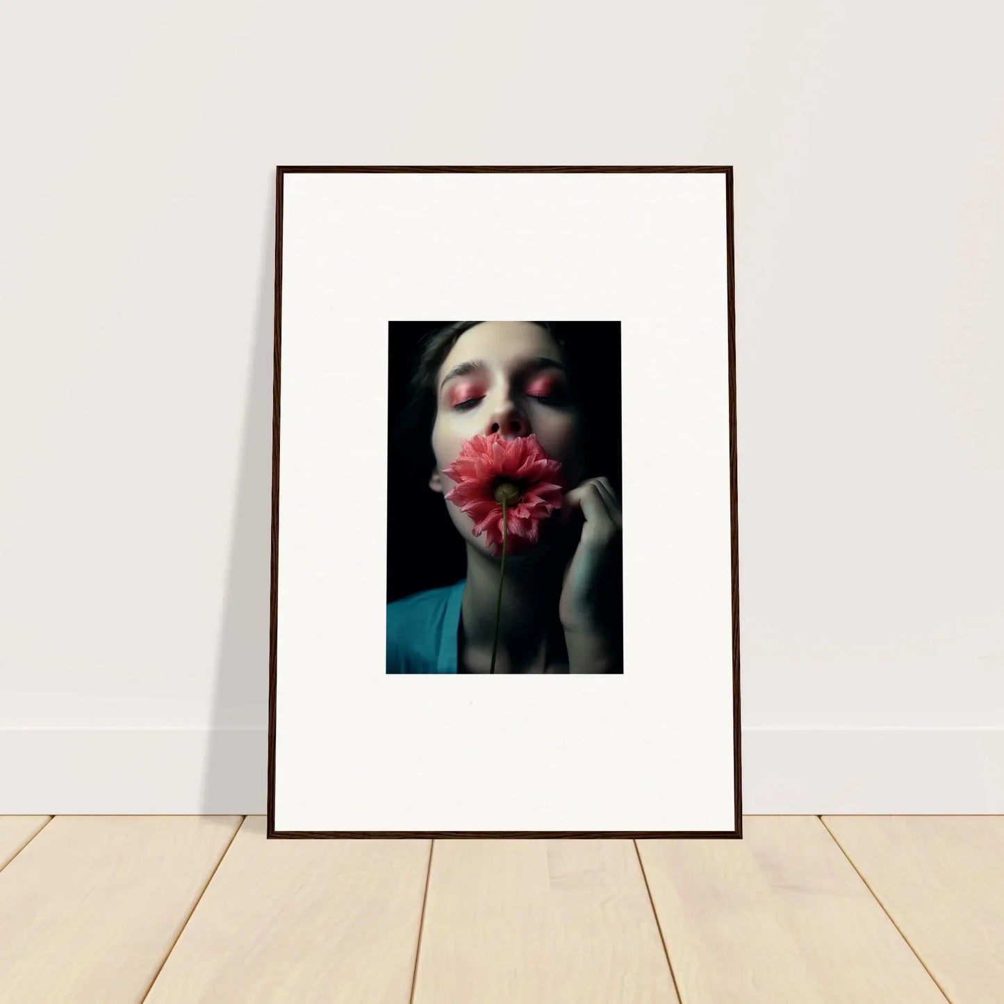 Framed wall art of a person with a pink flower, perfect for room decoration