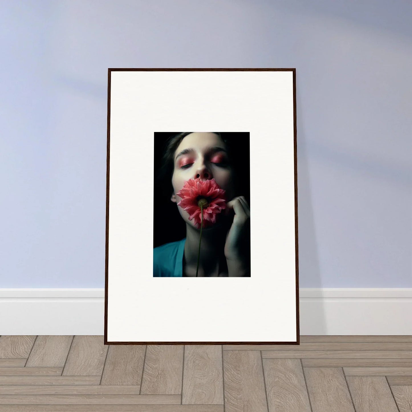 Framed canvas print of a person with a red flower, perfect wall art for room decoration