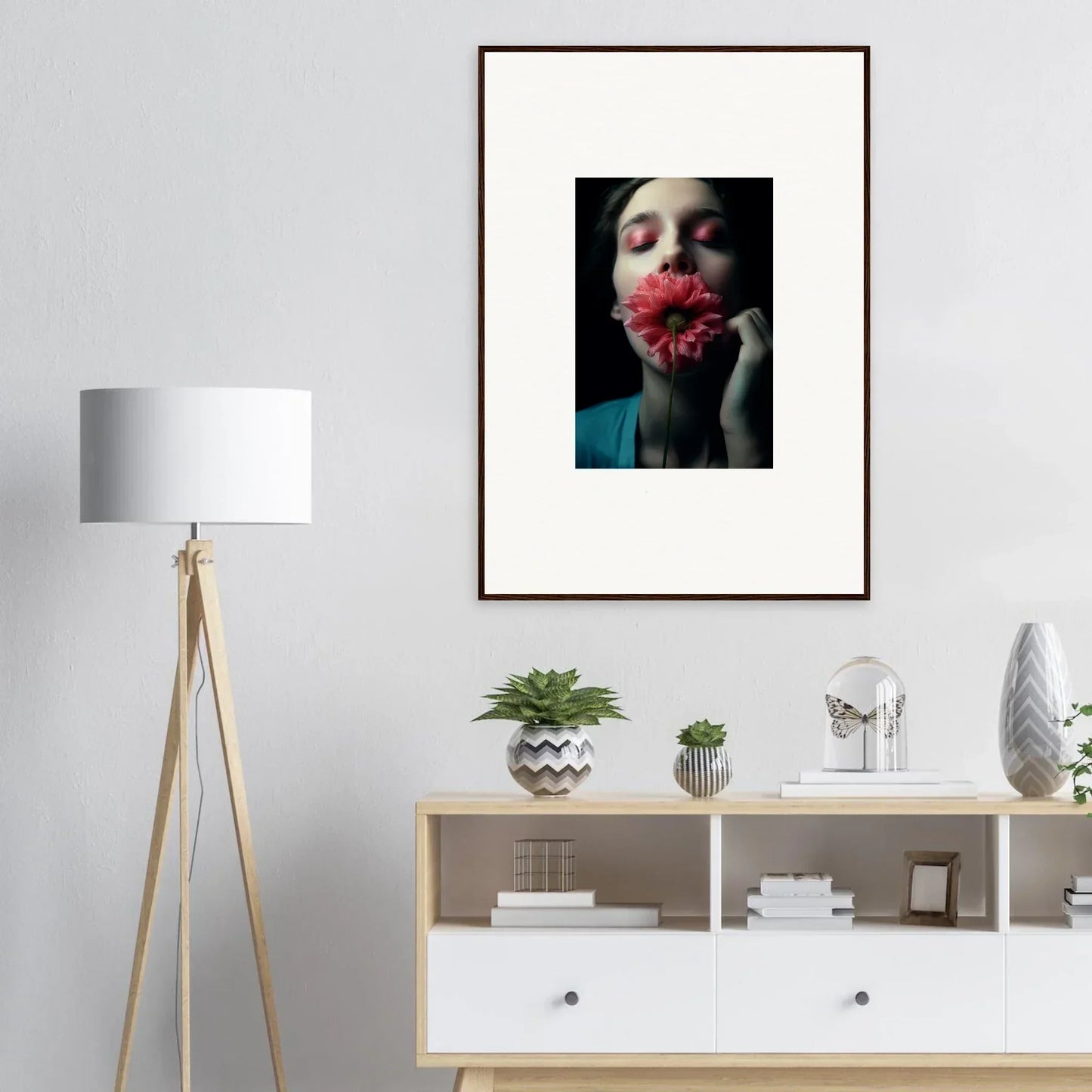 Framed portrait of a person with a red flower, perfect wall art for room decoration
