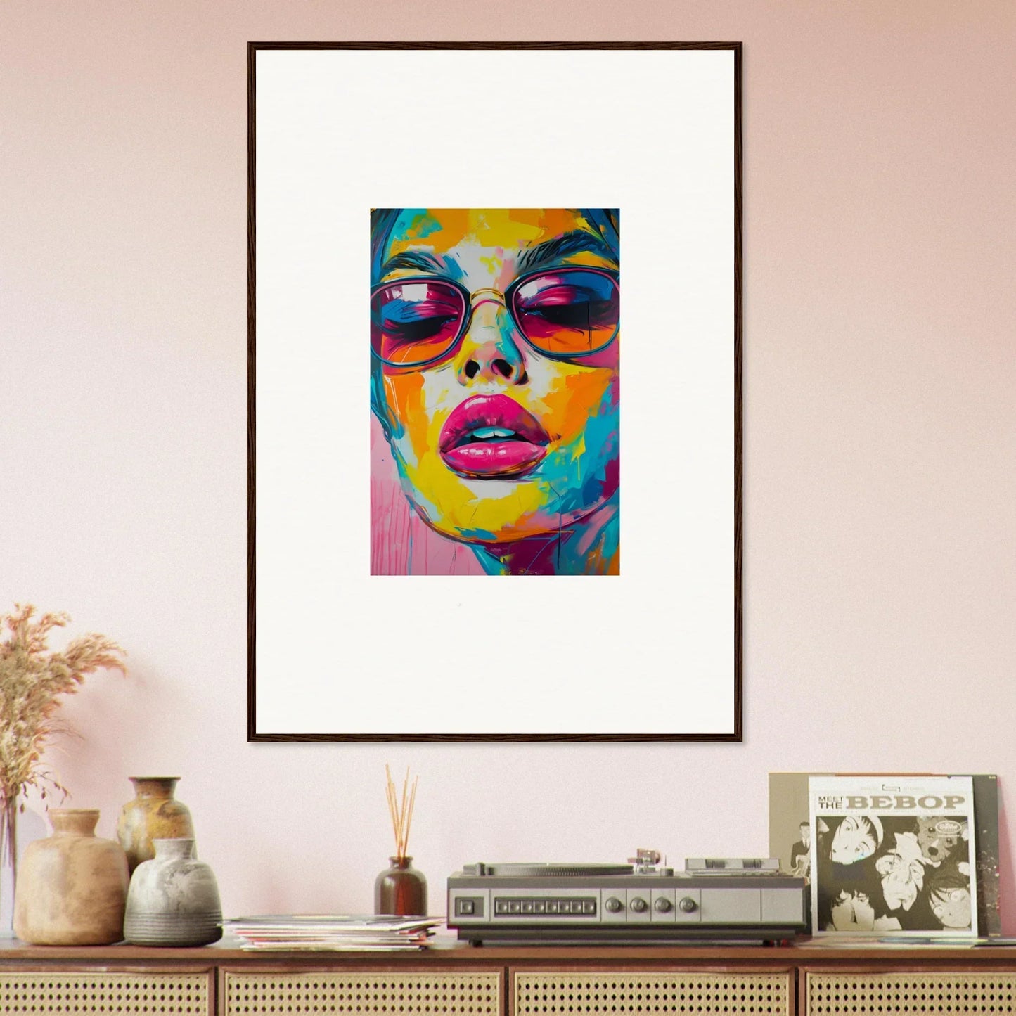 Framed wall art of a person in sunglasses and vibrant lips for Spectra Parade room decor