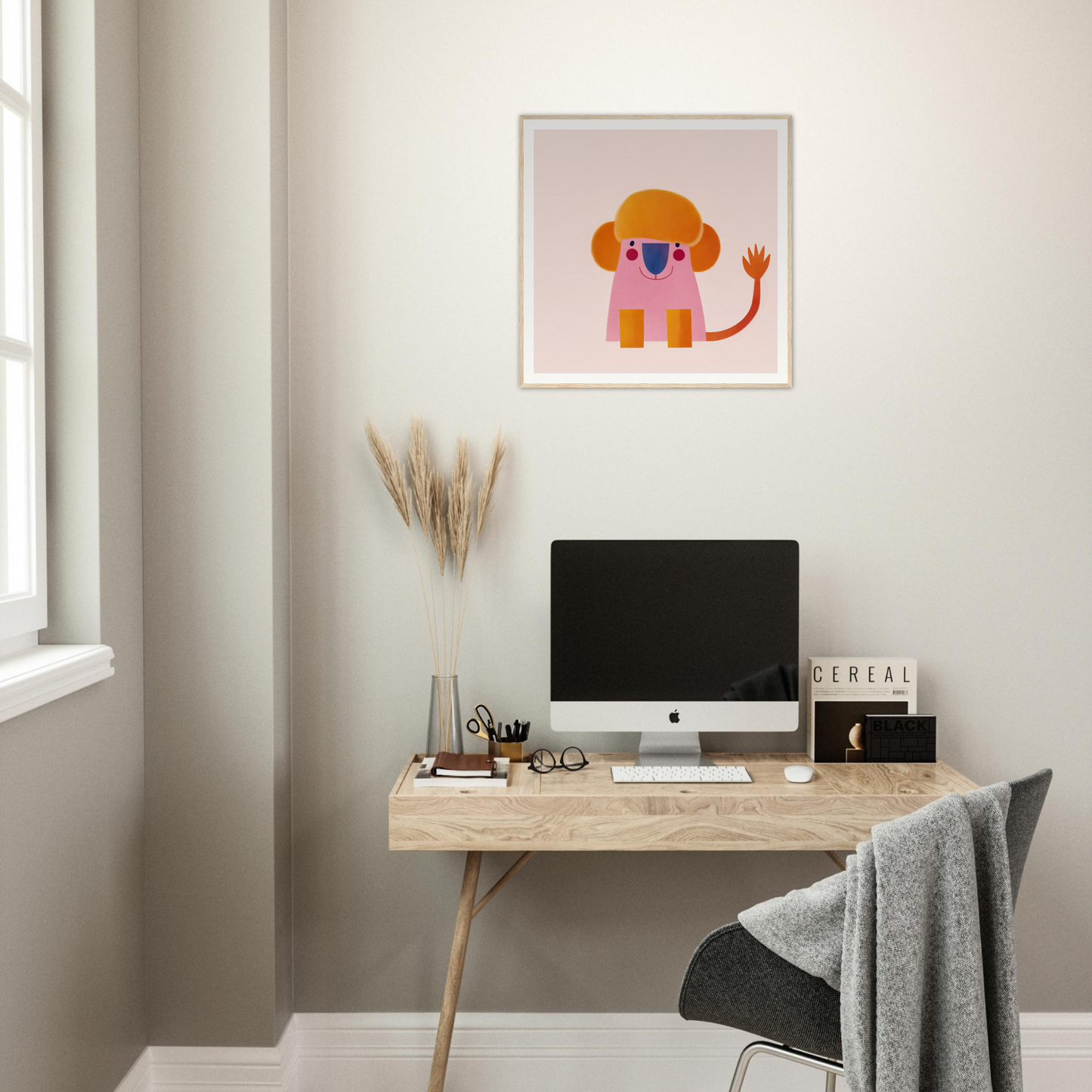 Minimalist wooden desk featuring an iMac and Playful Prismatic Roar artwork