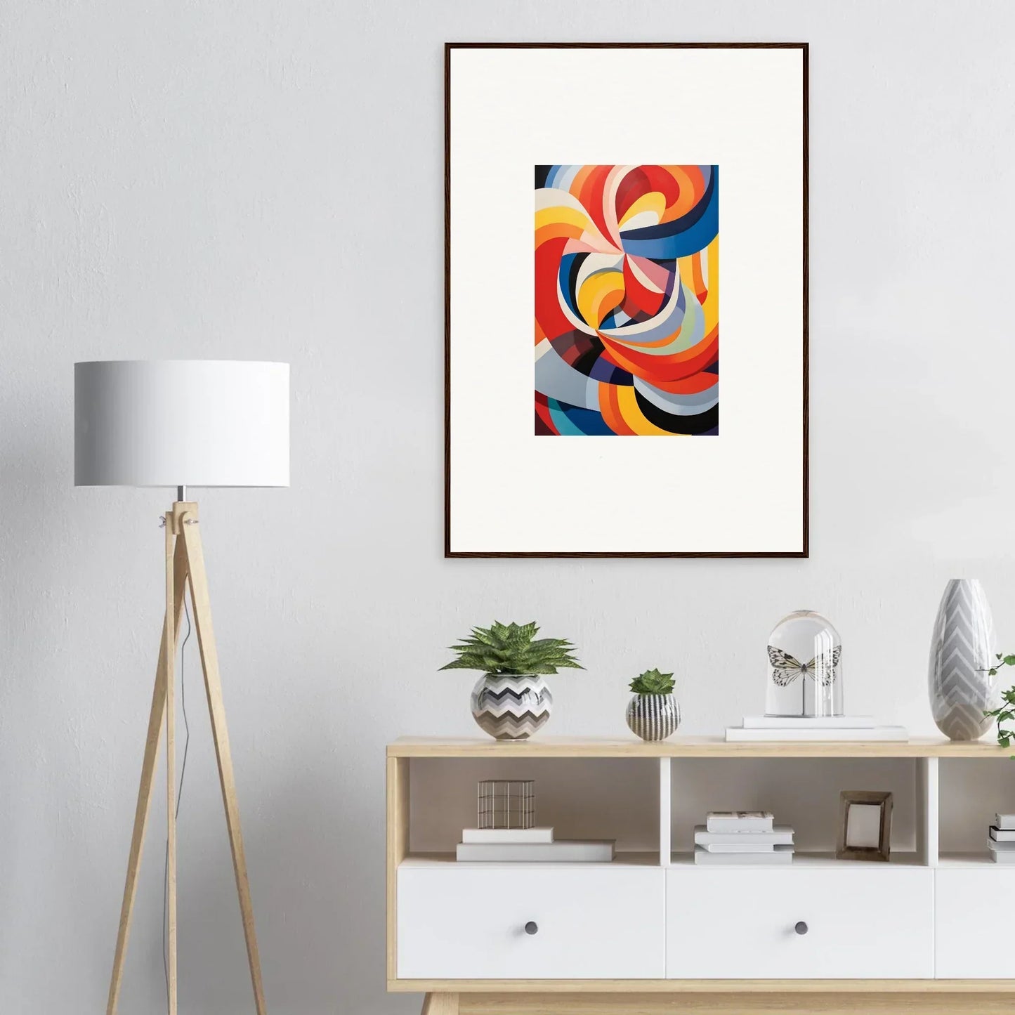Abstract art of bold curved shapes in red, yellow, blue, and gray for Prismatic Gleam Symphonics