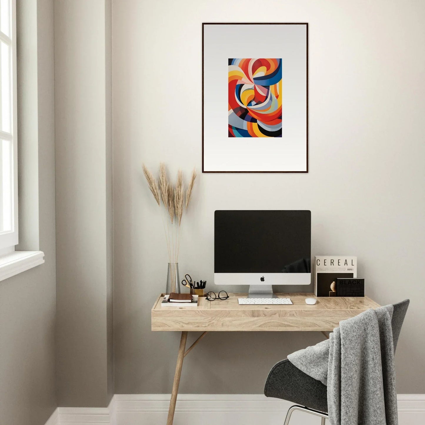 Minimalist wooden desk with iMac and Prismatic Gleam Symphonics framed wall art